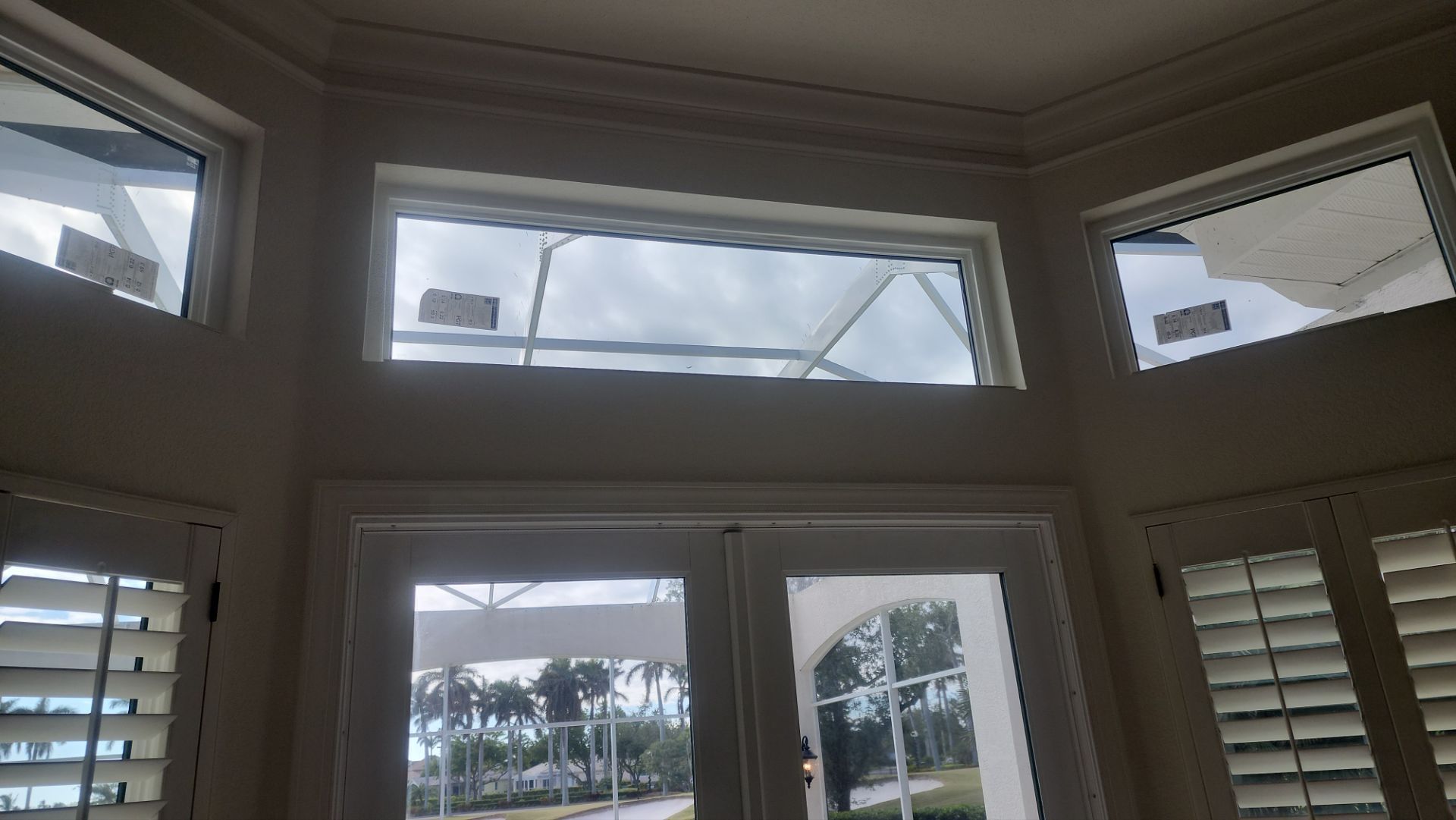 Window Installation using PGT Vinyl White-Bronze by Windows For Life 