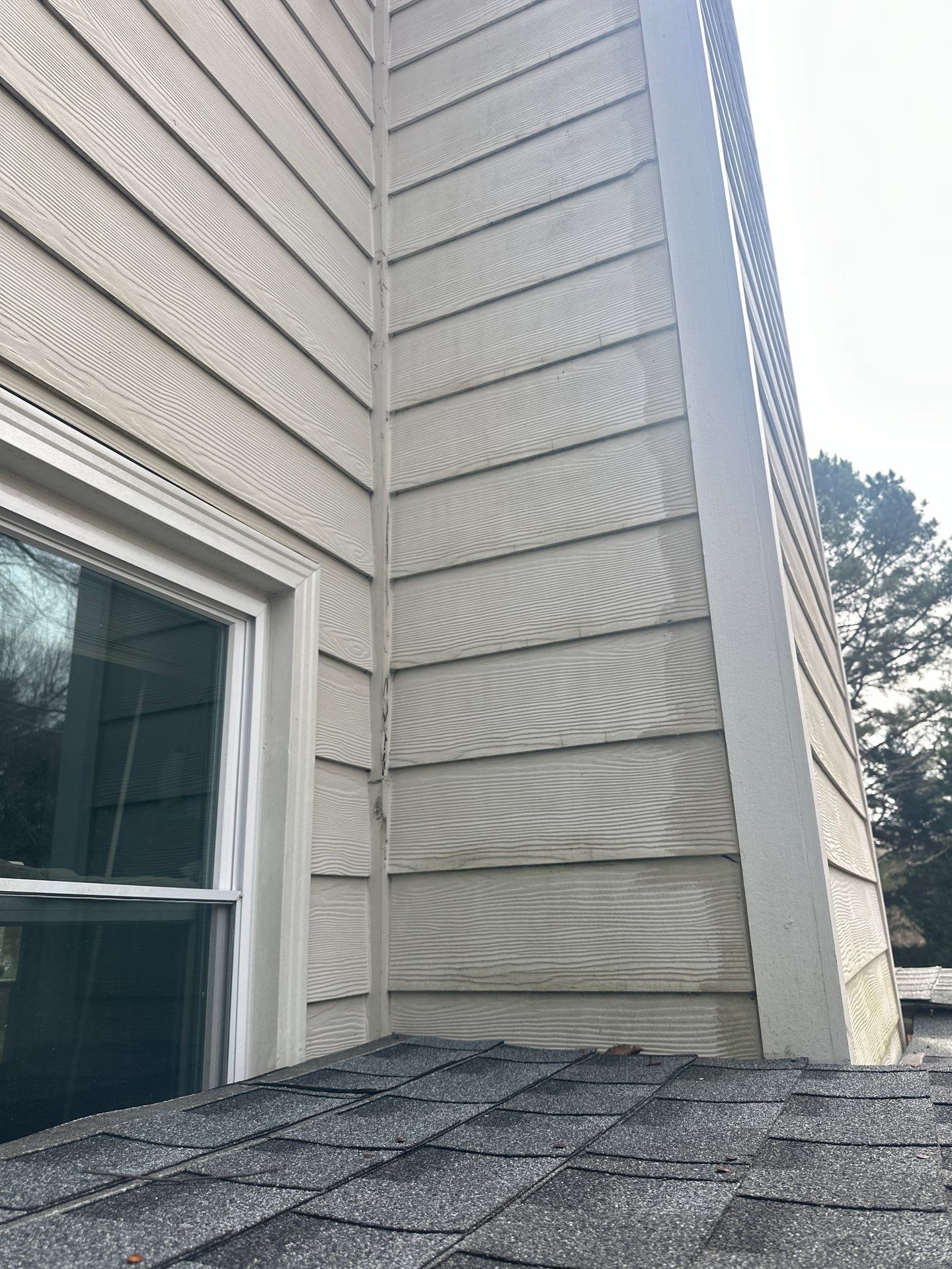 Marietta, GA Chimney Siding, Fascia, and Soffit Replacement using James Hardie Lap Siding, Hardie Trim, and Hardie Panel by Nelson Exteriors 