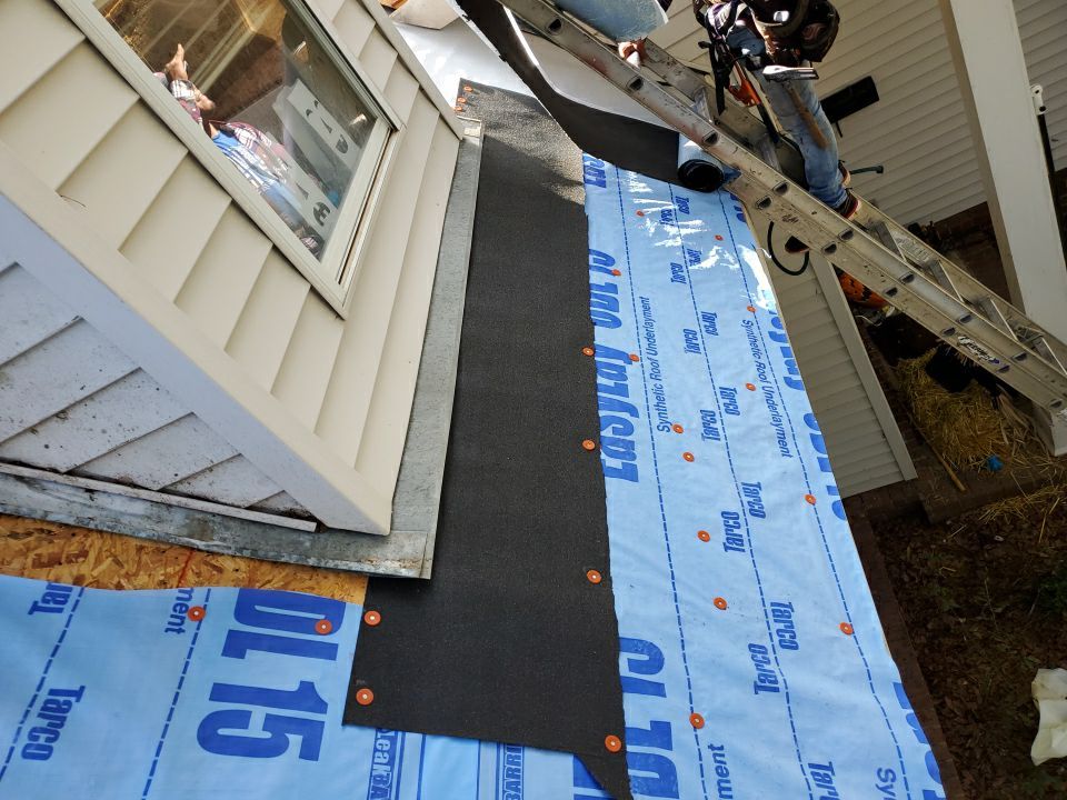 Residential Roofing Installation using Roof Replacement by American Roofing & Construction LLC