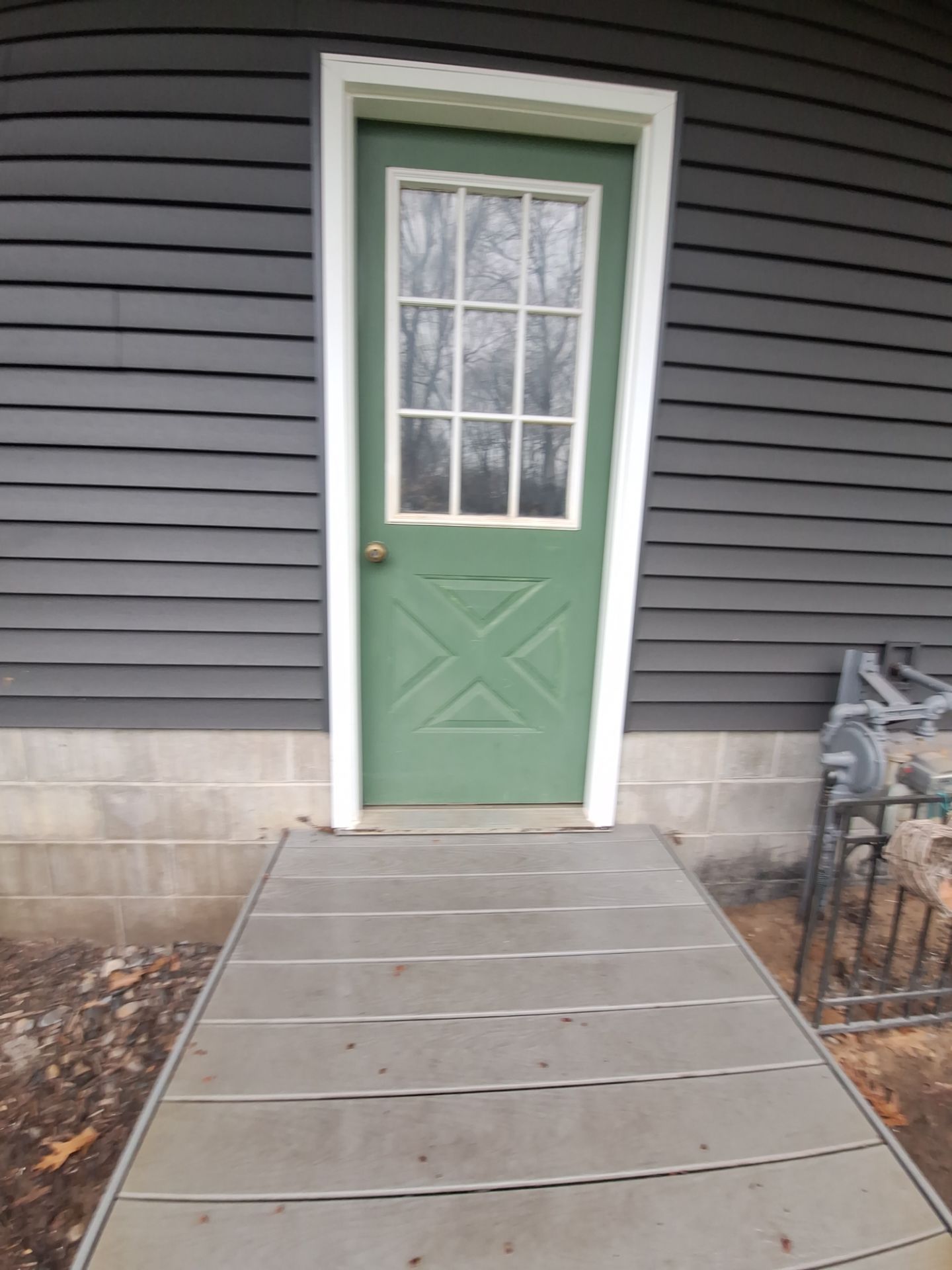 Exterior Foundation Painting in Muskegon Michigan by Gordon Painting