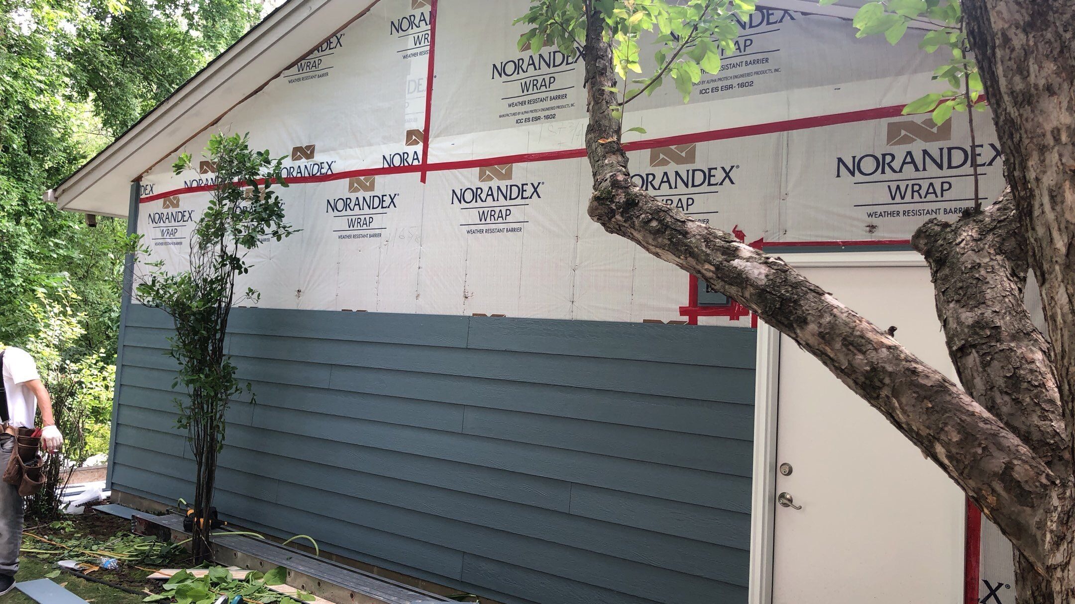Siding Installation using LP SmartSide and Pella Vinyl Windows by MODERN EXTERIOR SYSTEMS