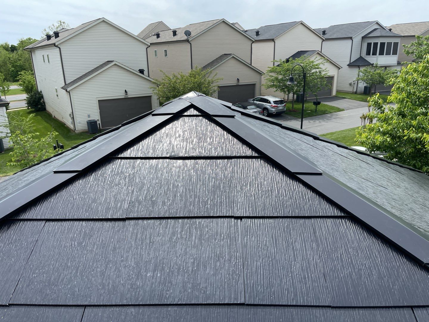 Tesla Solar Roof using Tesla Solar Roof V3 tiles by American Home Contractors