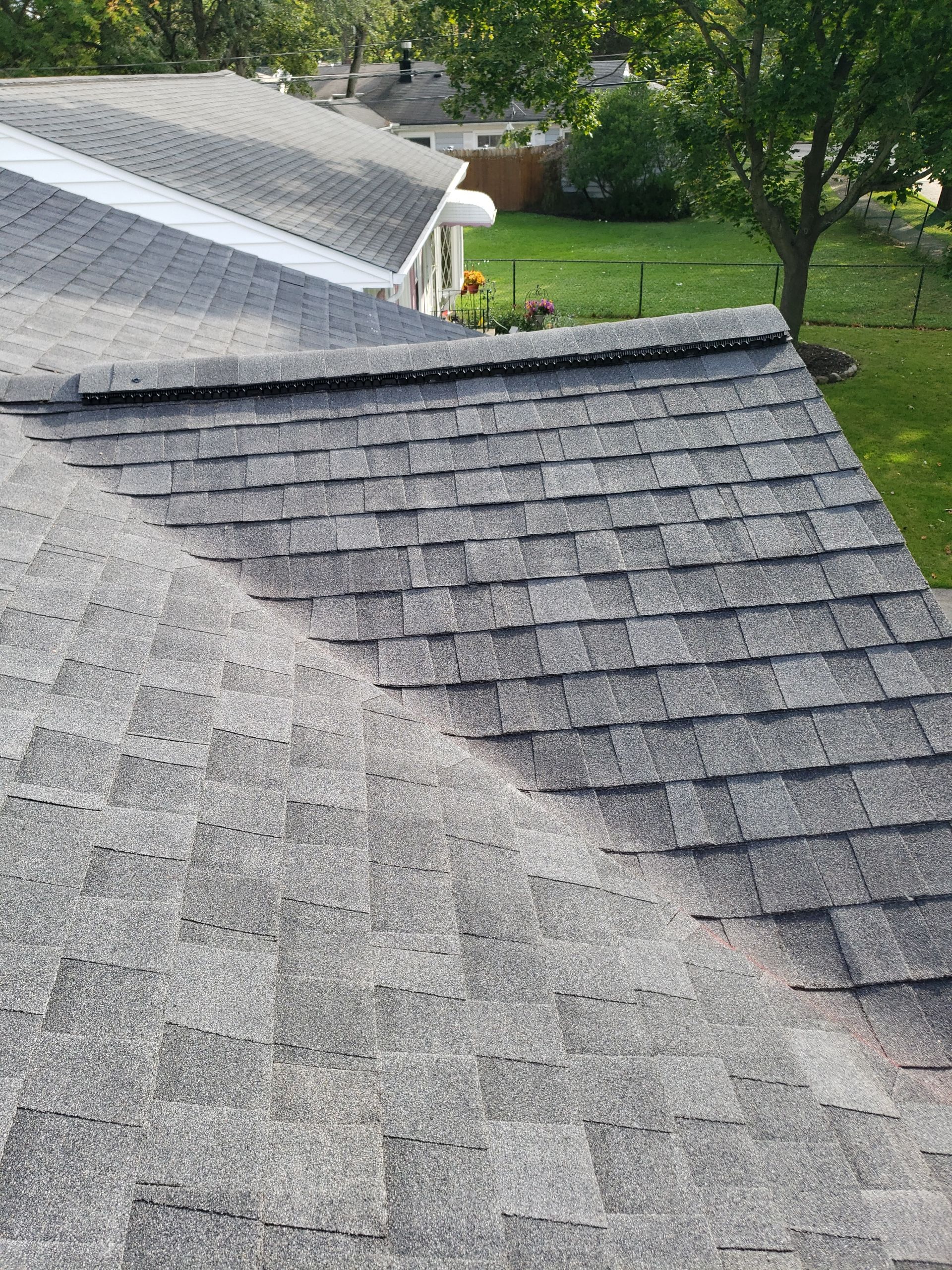 ATLAS PINNACLE COLOR: PRISTINE BLACK SHADOW DRIP EDGE: WHITE by Eagle Eye Roofing