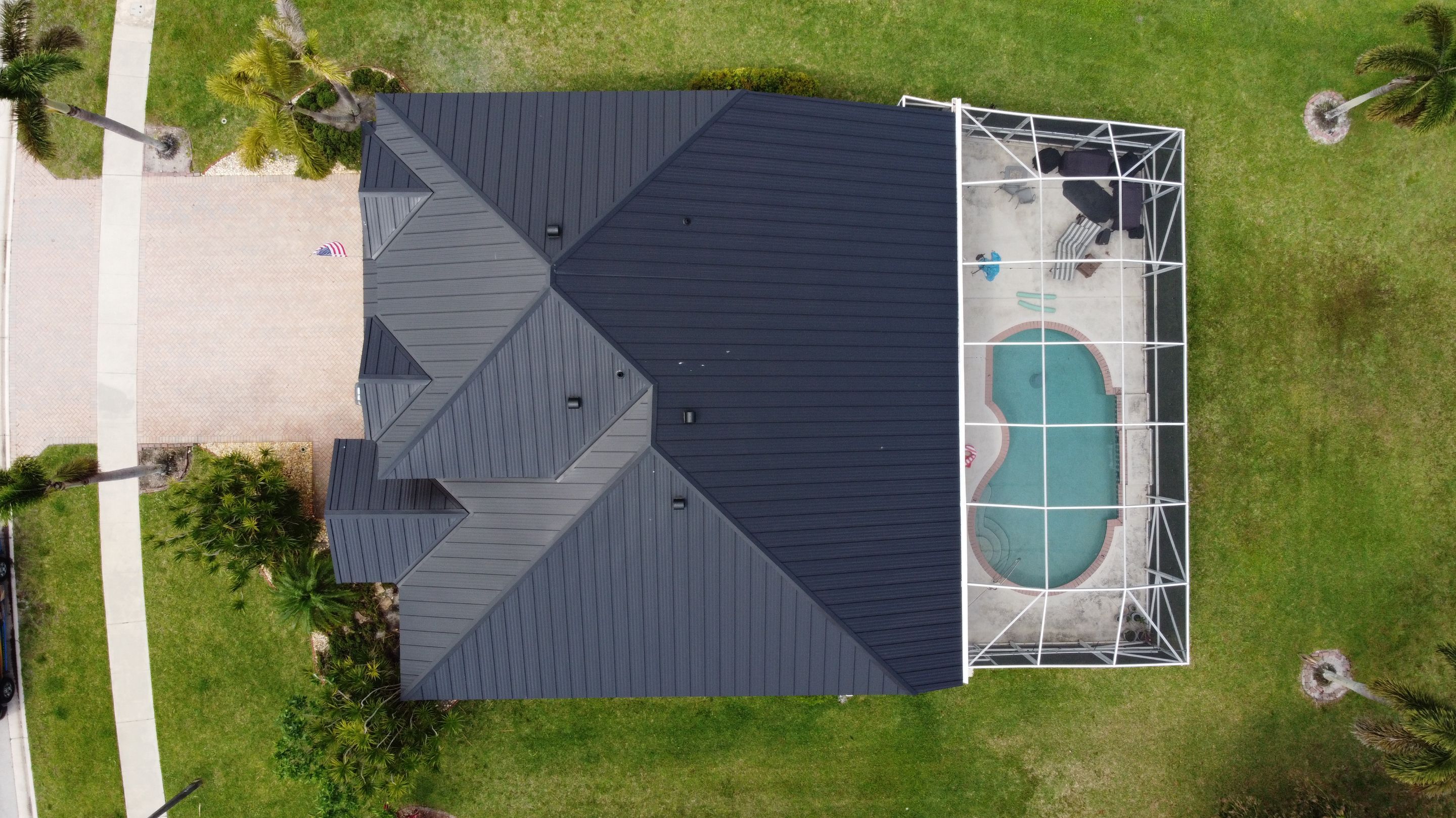 Residential Roofing Installation using 1" Nail strip metal roof by BLUES BROTHERS ROOFING