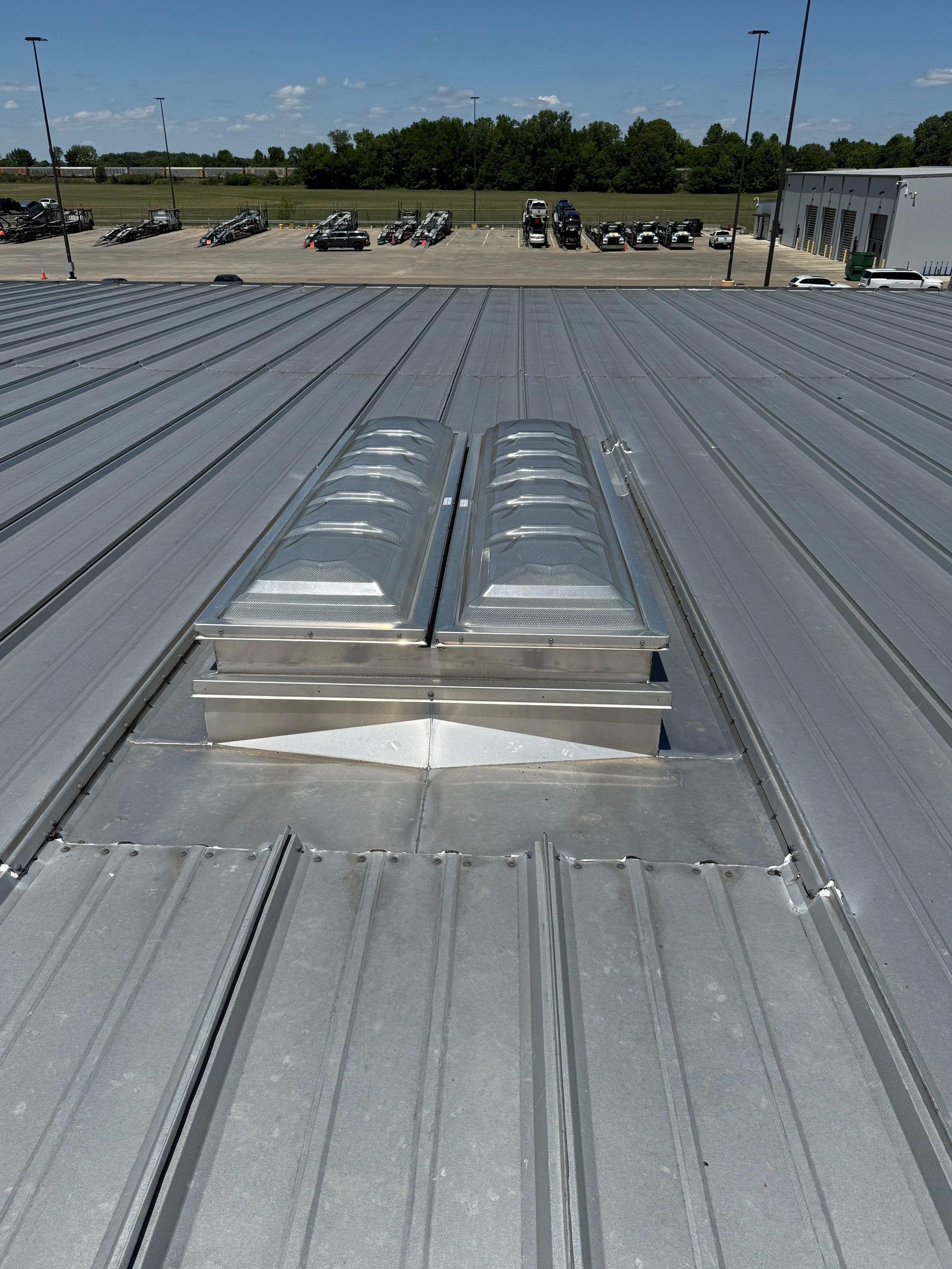 Commercial Metal Roof Repair and Skylight Sealing in West Memphis by Revival Roofing Services