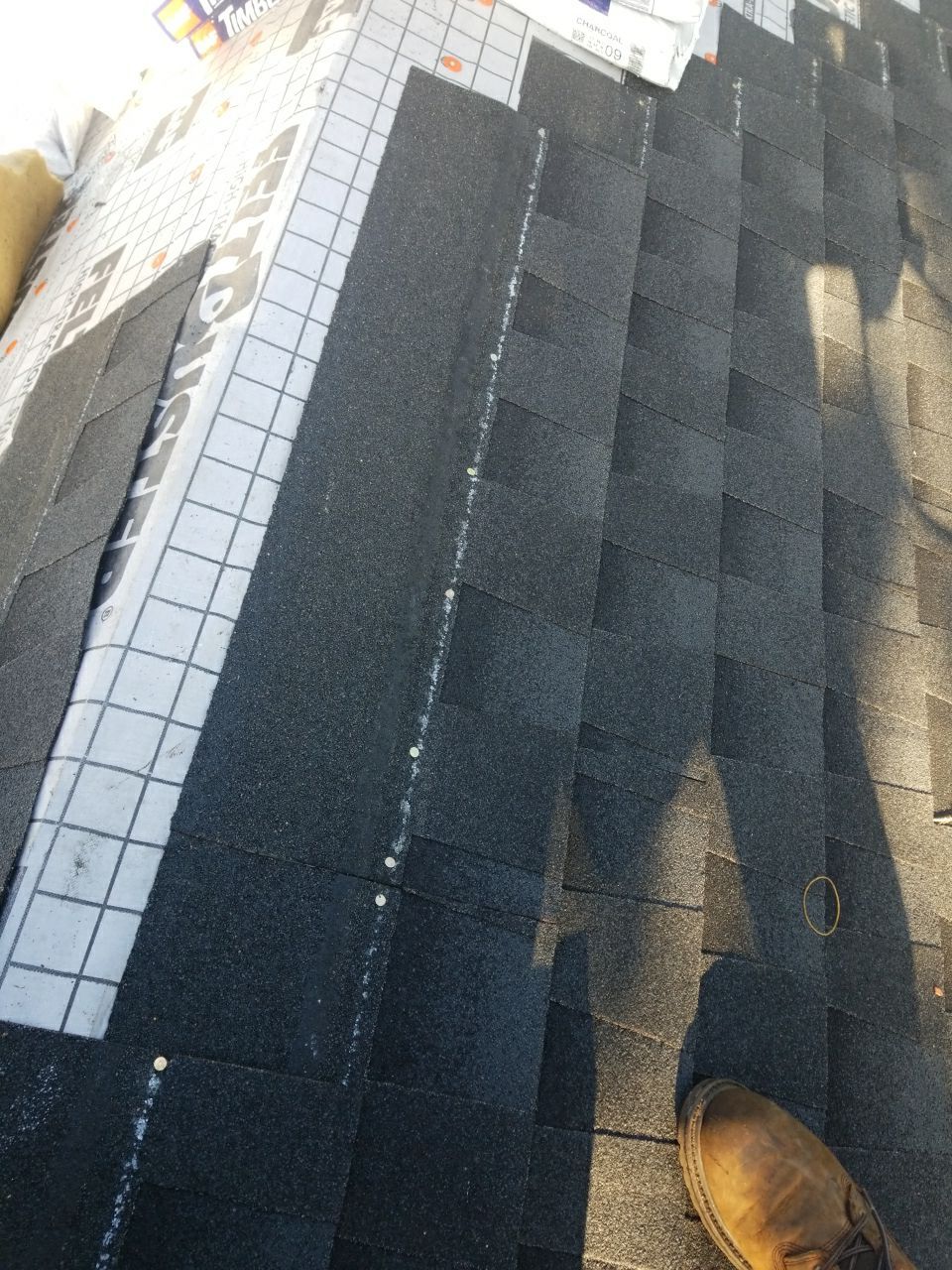 Residential Roofing Installation using Roof Replacement by American Roofing & Construction LLC