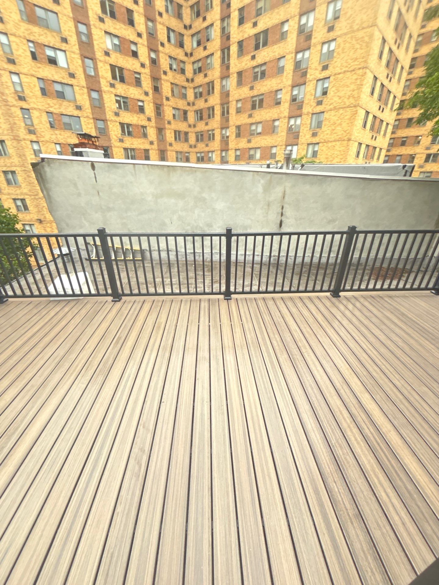 Roof Replacement and Custom Trex Roof Top Deck Project in Philadelphia, Pennsylvania by Philadelphia Quality Roofing