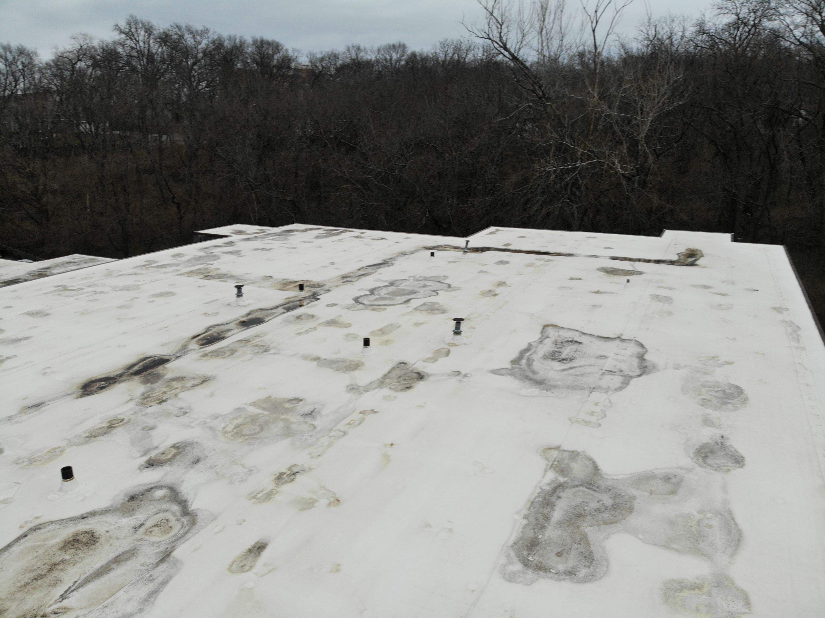 Commercial Flat Roofing System - PVC Membrane & Fluid Applied Coatings  by Titan Commercial & Residential Roofing 