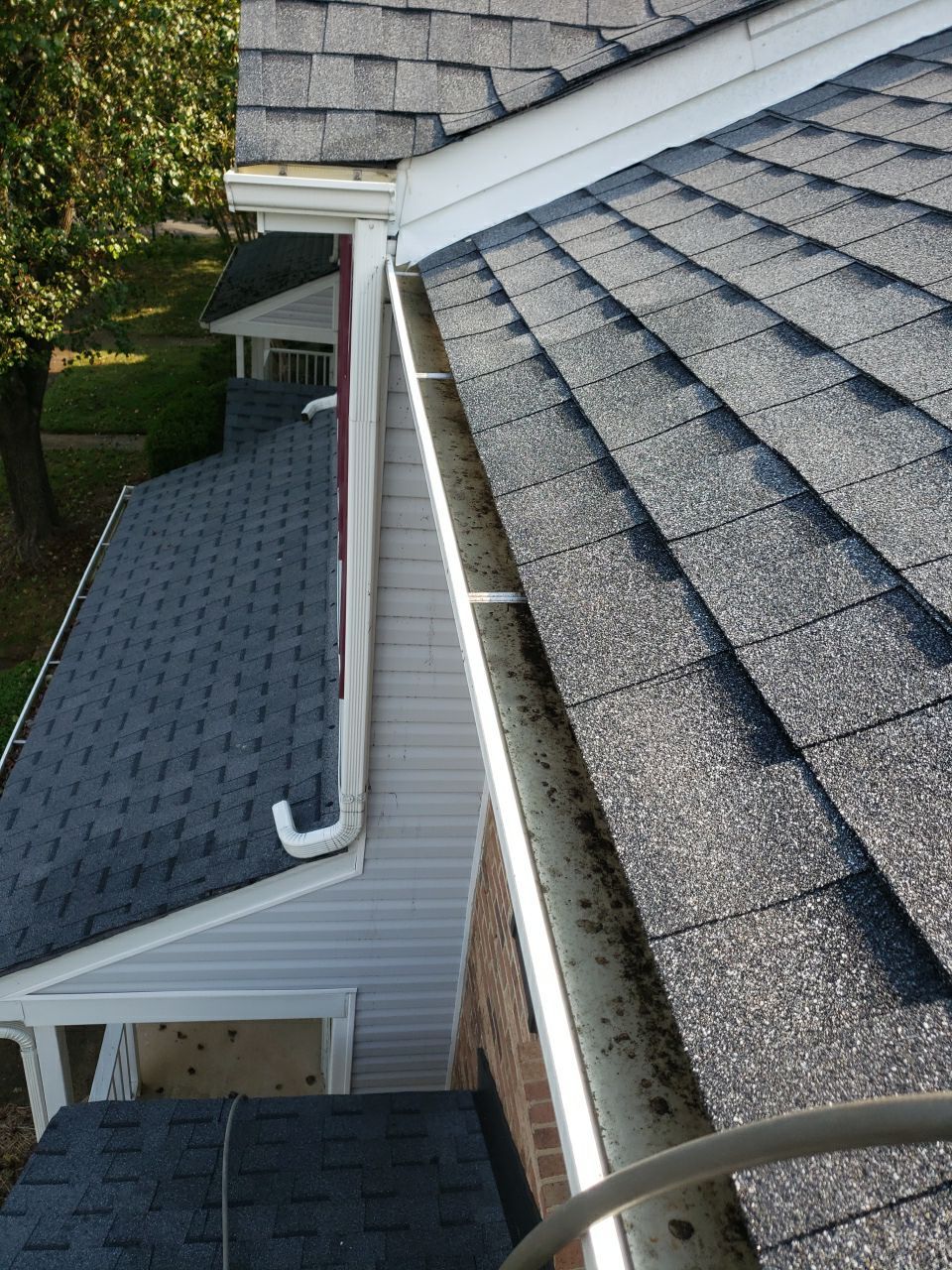 Gutter Cleaning using water by Power Wash Masters LLC