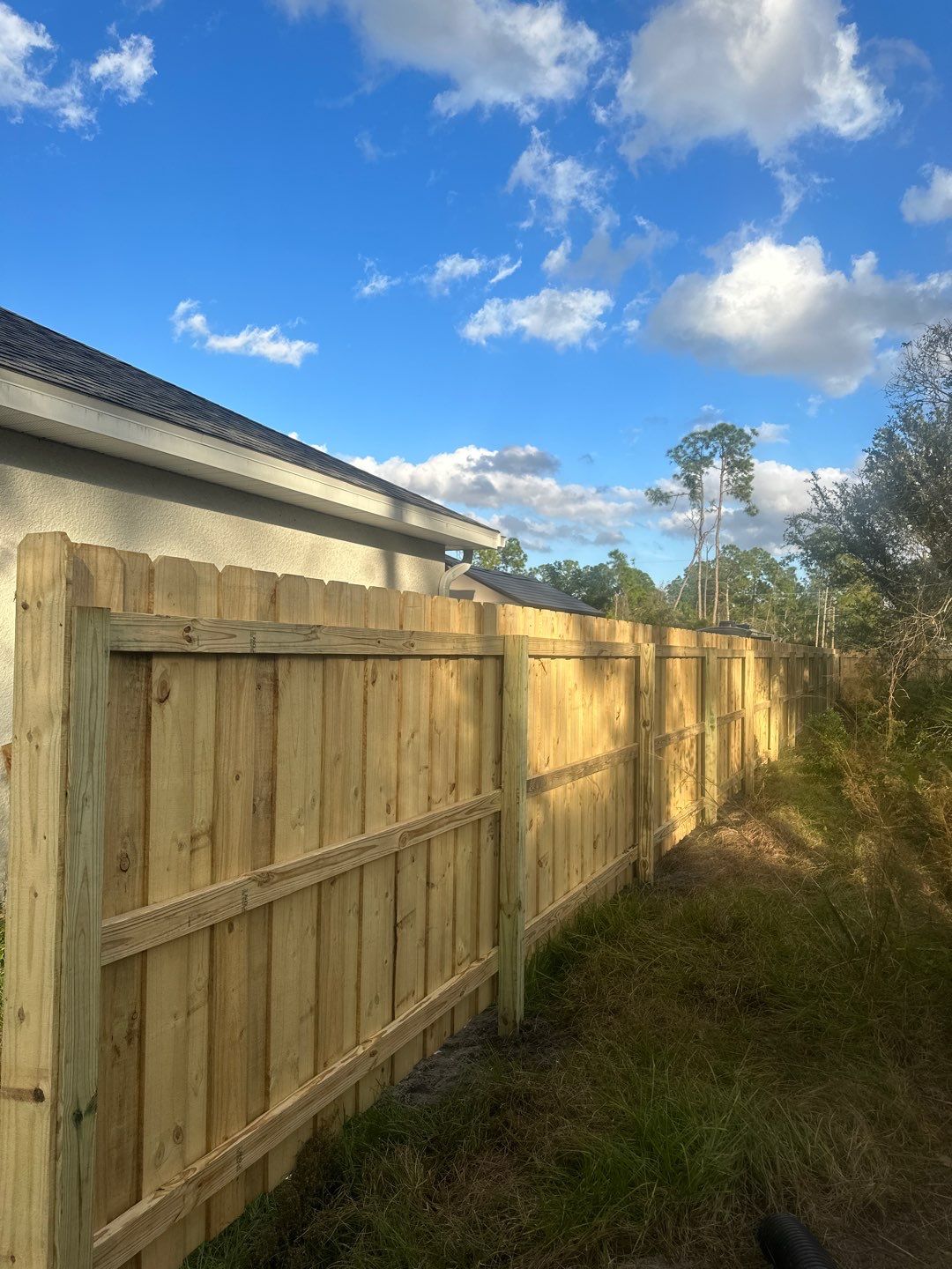 Wood Fence Installation using Vertical Wood Fence by Asap fence and gates, LLC