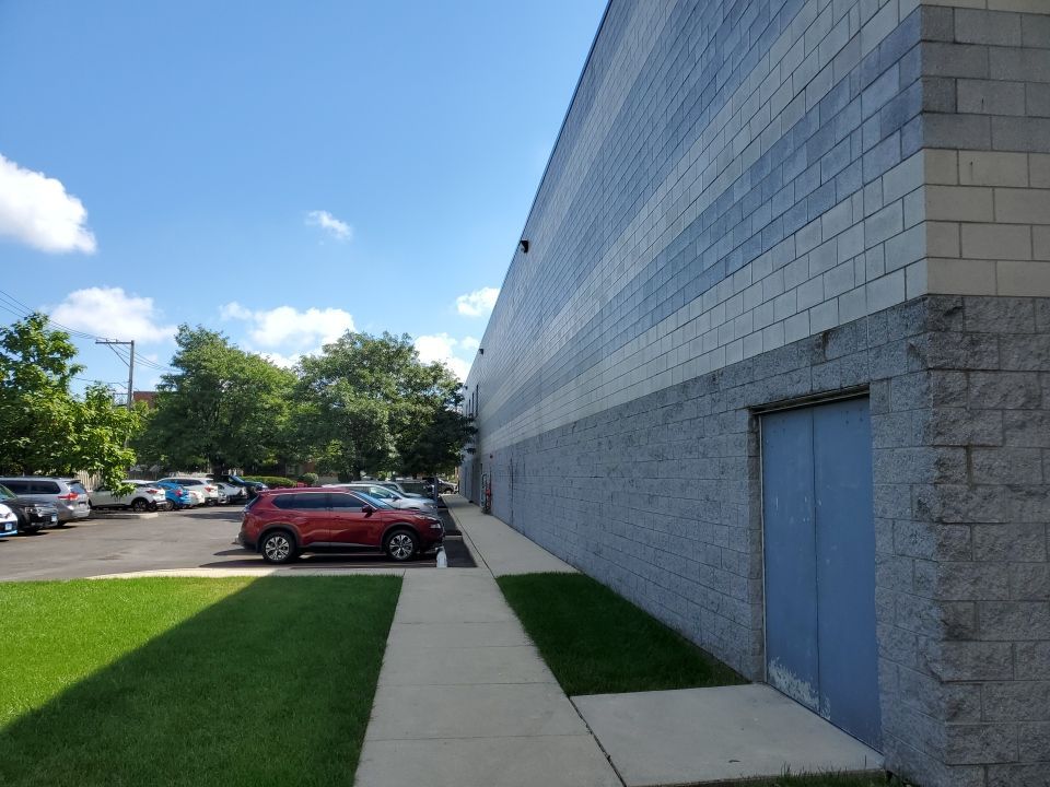 commercial pressure washing using Algaecide, soft wash soap by Northern Power Washing LLC.