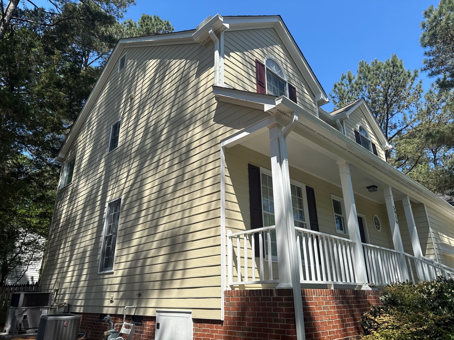 Exterior paint and siding replacement by GonzalezPainters & Contractors Inc 