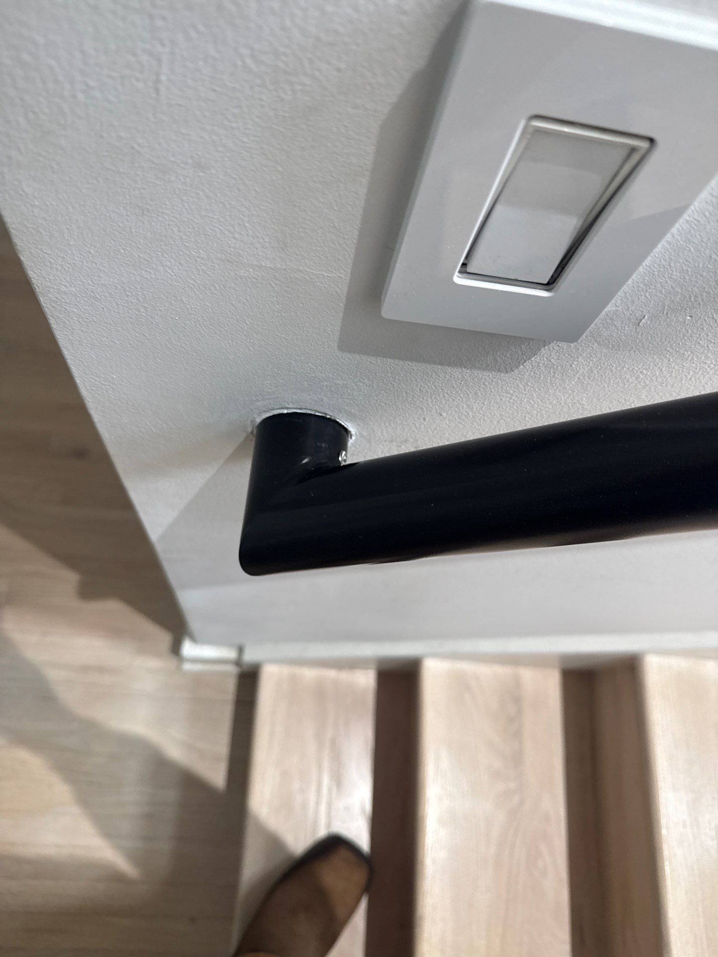 Two Black Metal Handrail Installation Across Multi-Level Washington Staircases by Capitol Iron Works