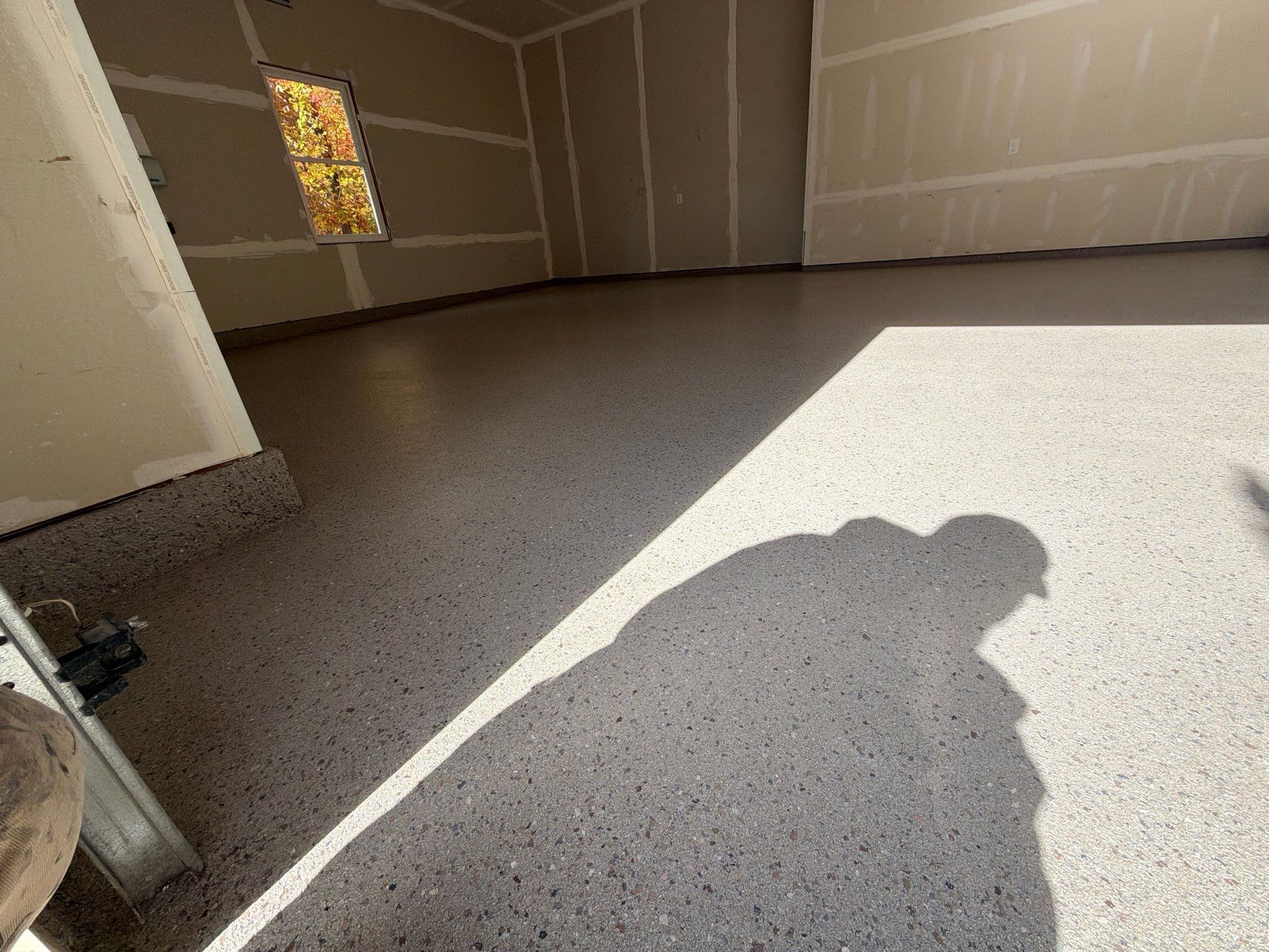 Hudsonville Garage Renovation Featuring Finished Drywall and Flake Epoxy Floors by Gordon Painting