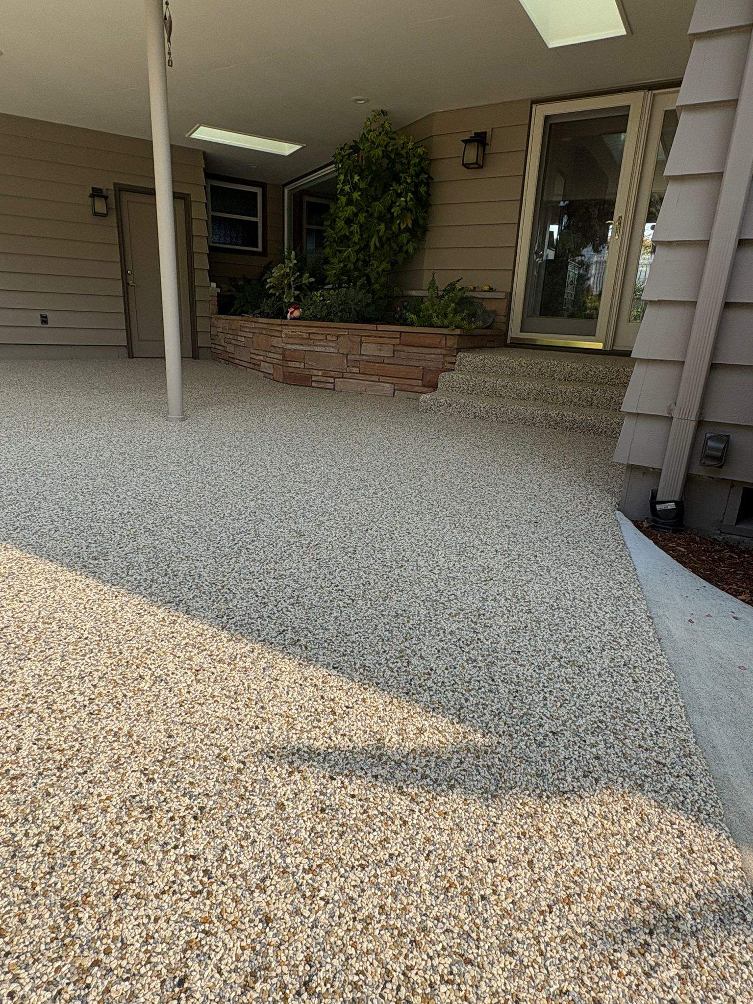 Timeless Charm Patio in Sistine Chapel by Concrete Coating Experts Inc.