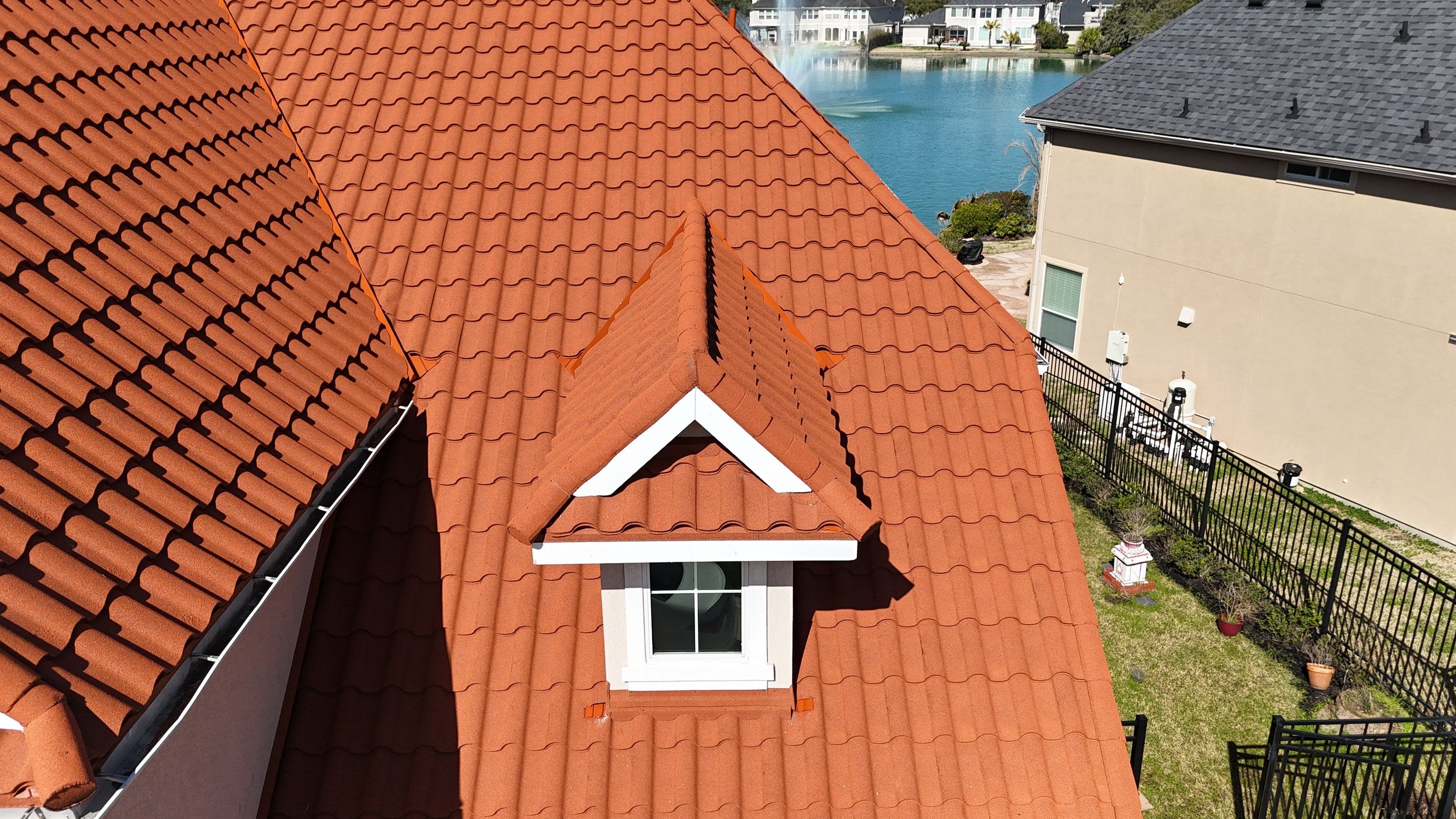 Stunning transformation using DECRA Villa Tile!  by Core Four Roofing