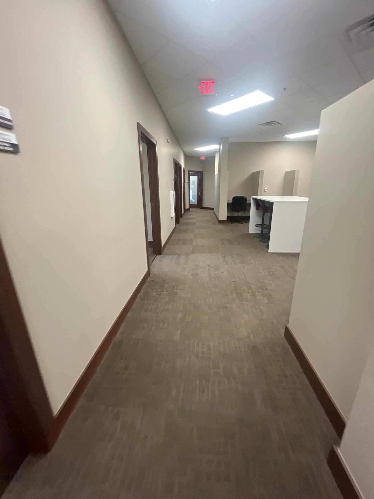 Commercial Office Interior Remodel and Modern Suite Refresh in Sioux Falls by Select Painting, Coatings & Garage Cabinets