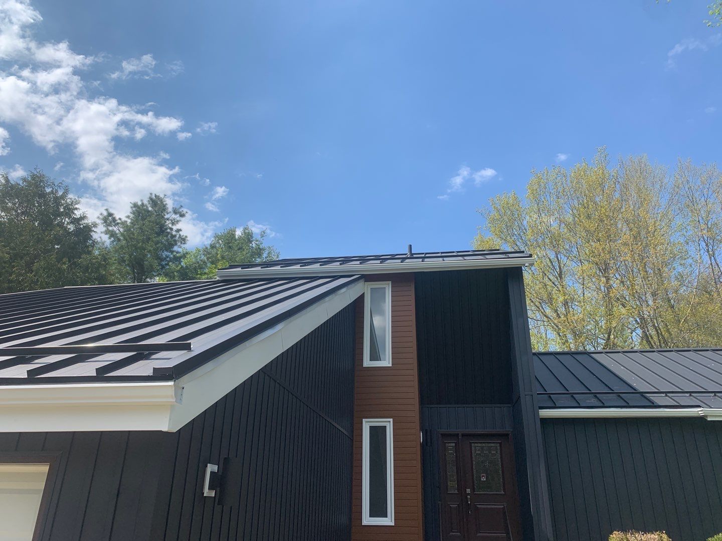 Residential Roofing Installation using 16" Standing Seam Panels by Jay Carter Roofing & Sheet Metal