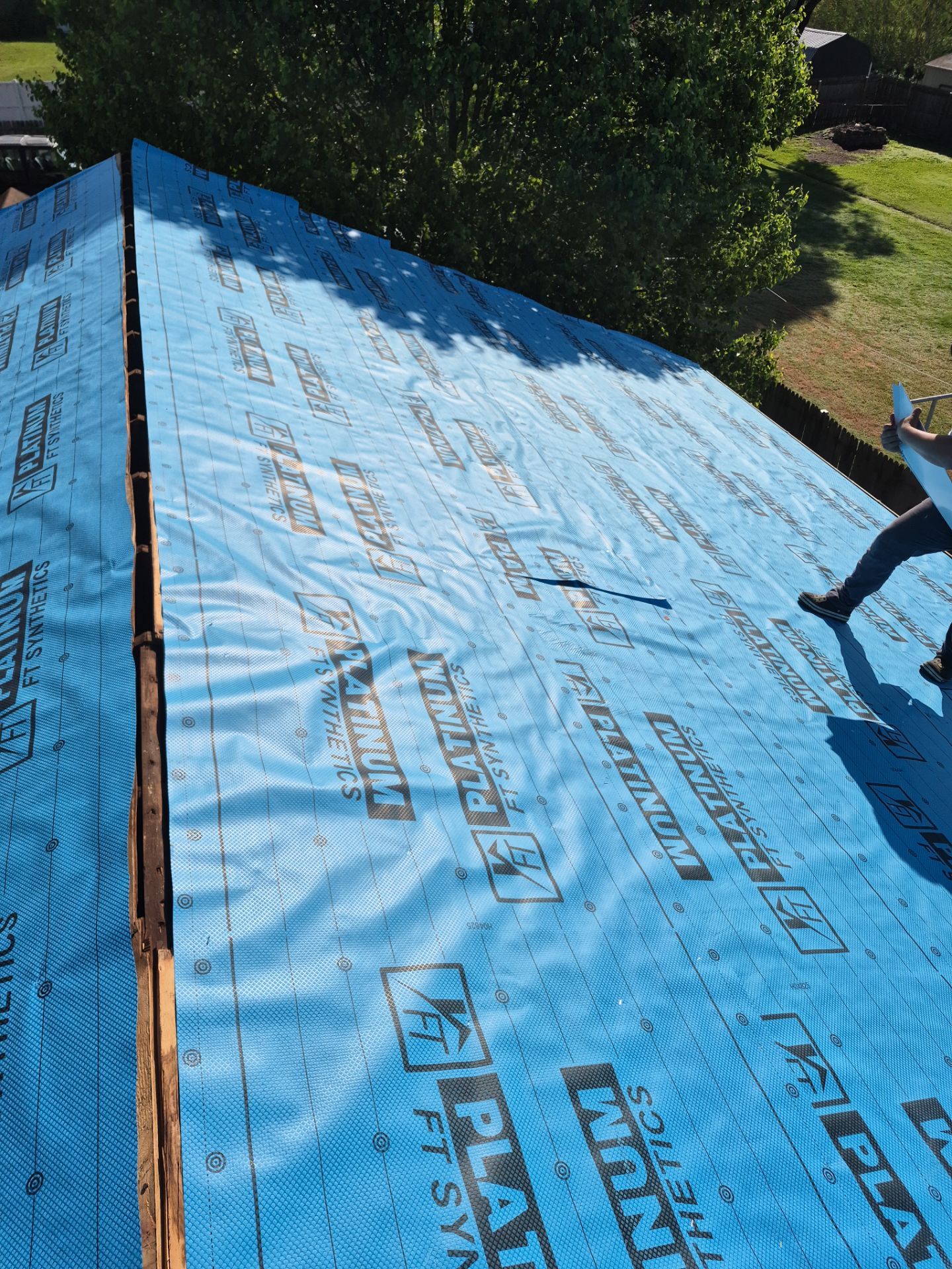 Residential Roofing Installation using Metal by Rainstoppers Roofing
