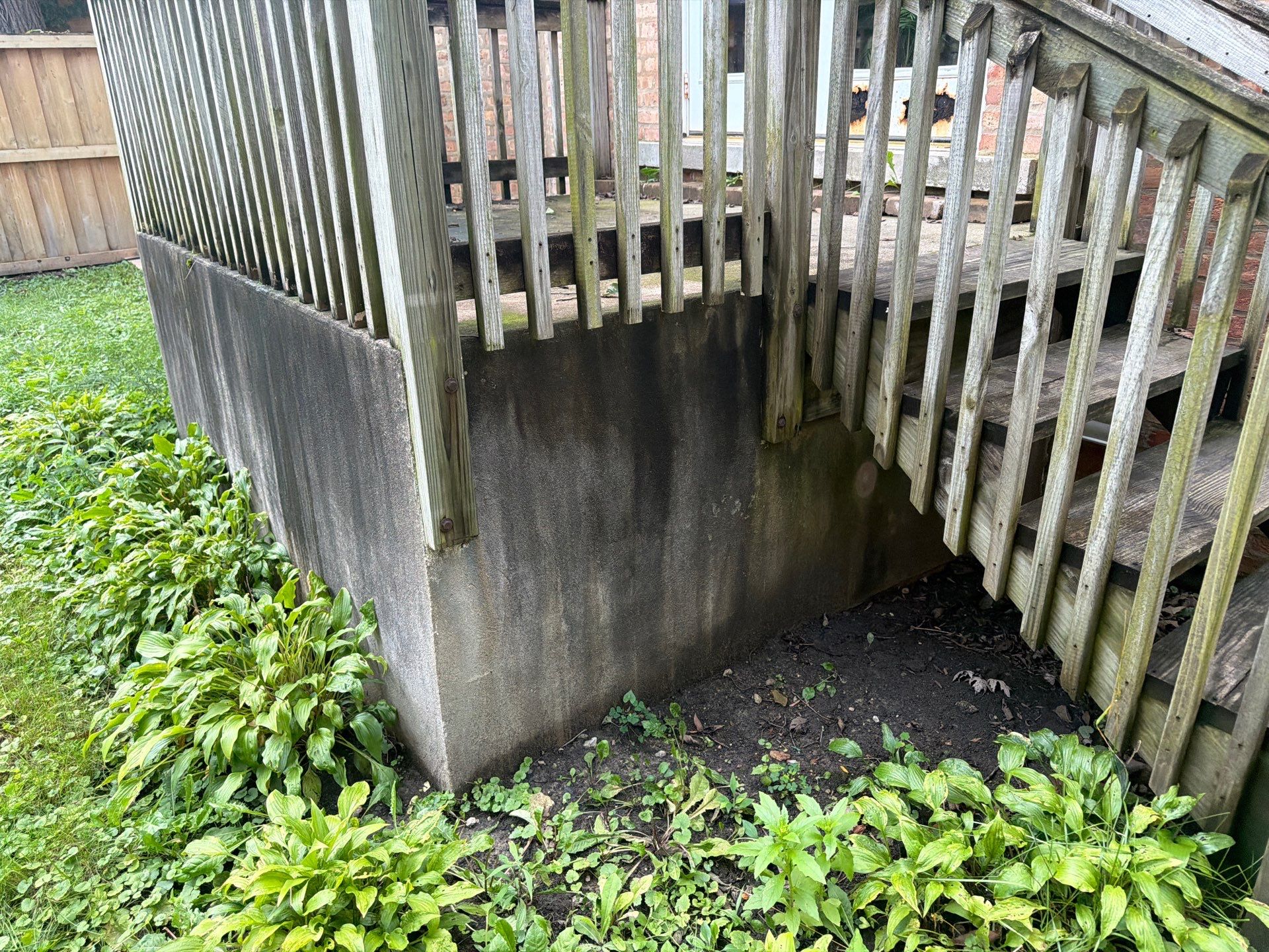Wood fence cleaning and sealing by Northern Power Washing LLC.