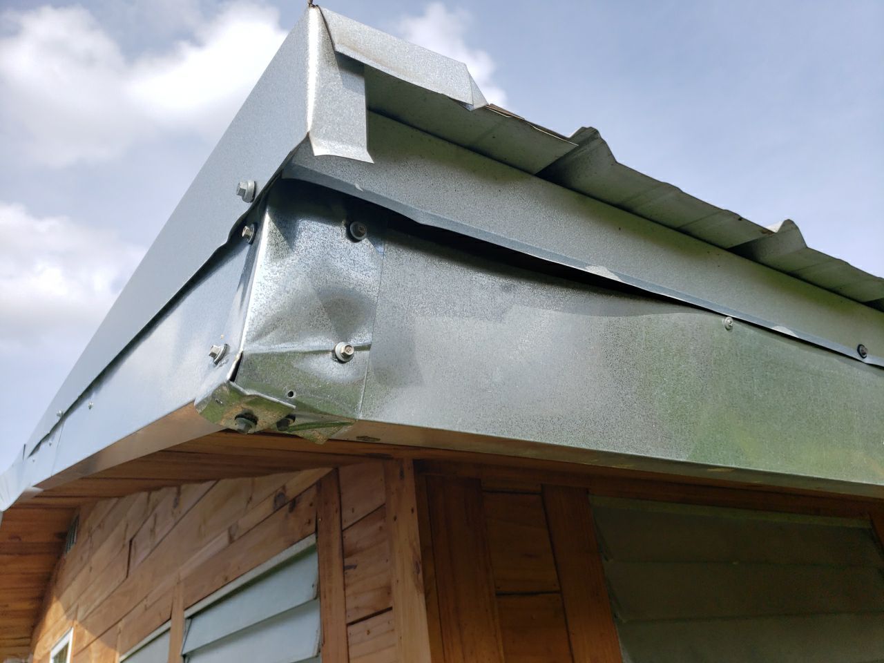 Gutter Installation using K-Style Seamless Gutters and Soffit and Fascia Replacement by Gutter Professors
