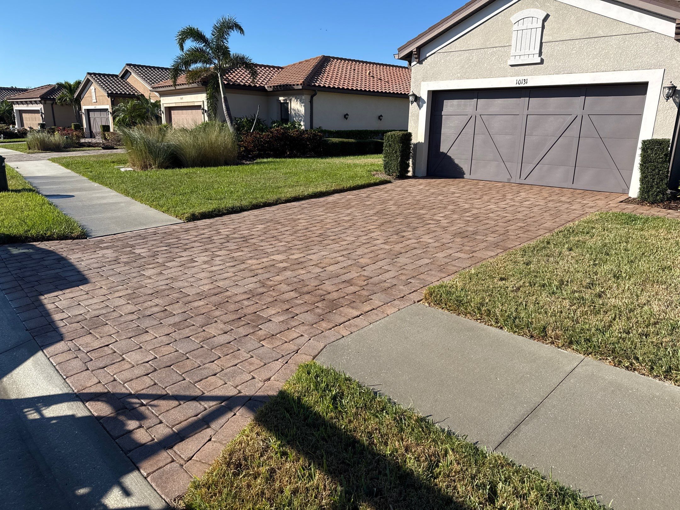 Paver Driveway, Walkway, Patio & Concrete Sidewalk Cleaning in Artisan Lakes Esplanade, Palmetto, FL | Sunshine AquaWash by Sunshine AquaWash