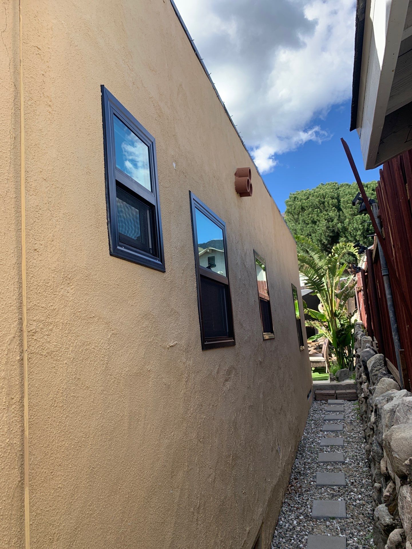 Window Installation using Black Anlin windows by American Window Company