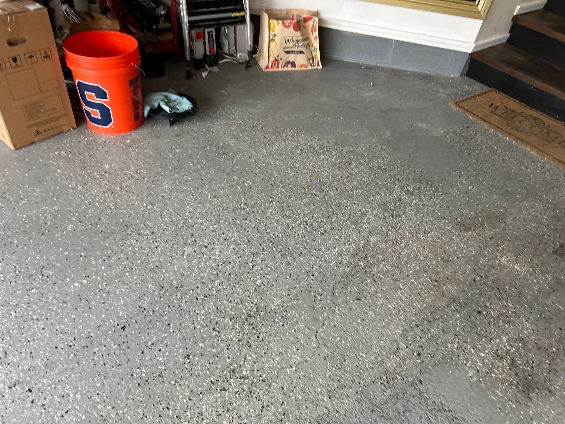 Silverado garage floor coating  by NG Masonry & Construction LLC