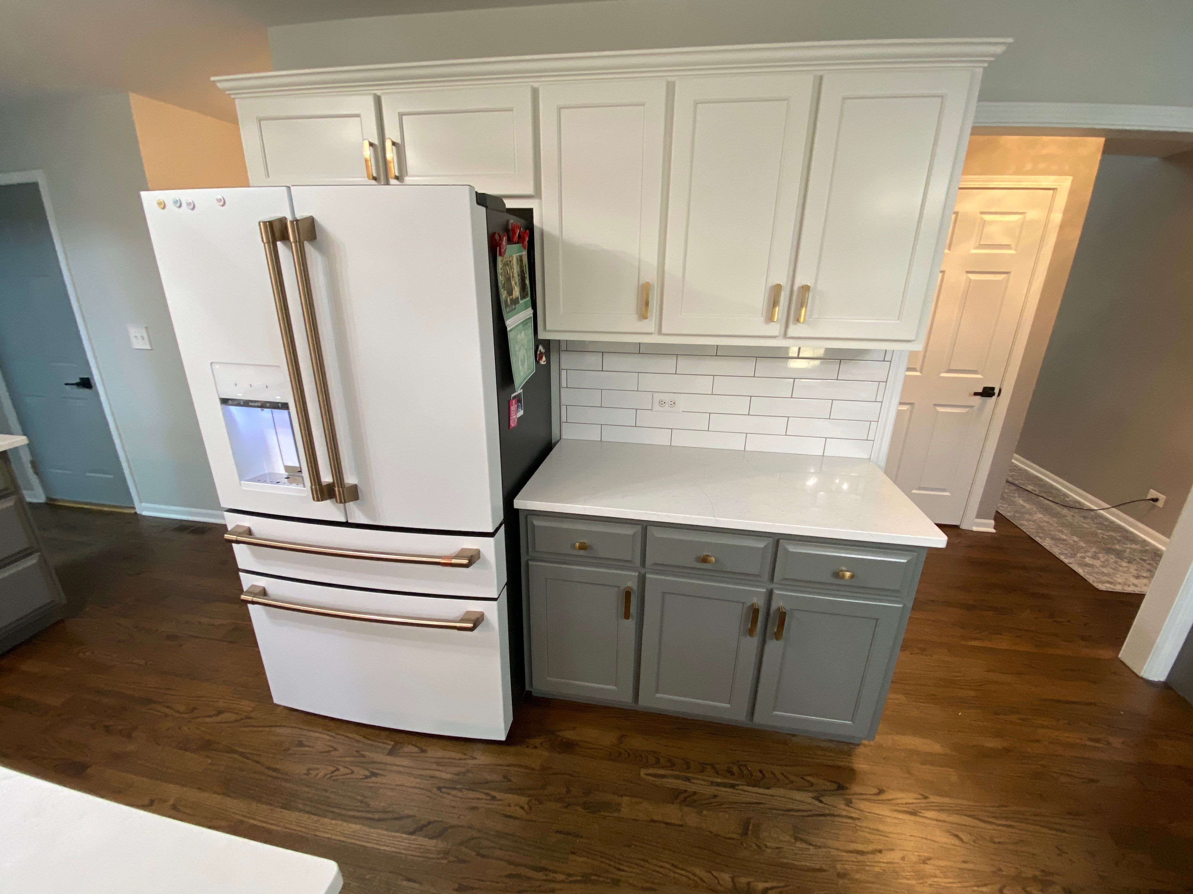 Two-Tone Kitchen Cabinet Painting & Staircase Painting in New Lenox by Powers Painting & Decorating, LLC