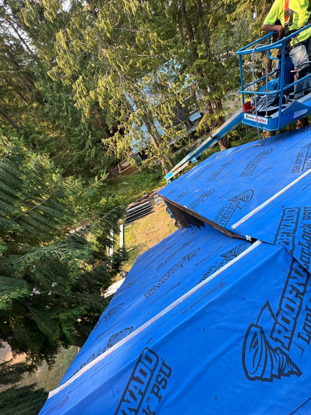 Residential ReRoofing Installation using 12" Prolok metal  by Top Notch Roofing Inc