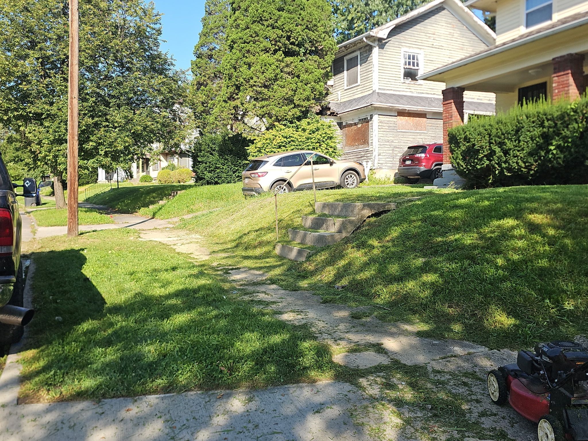 Residential Property Maintenance and Lawn Mowing in Dayton by Level Up Roofing and Restoration Services LLC