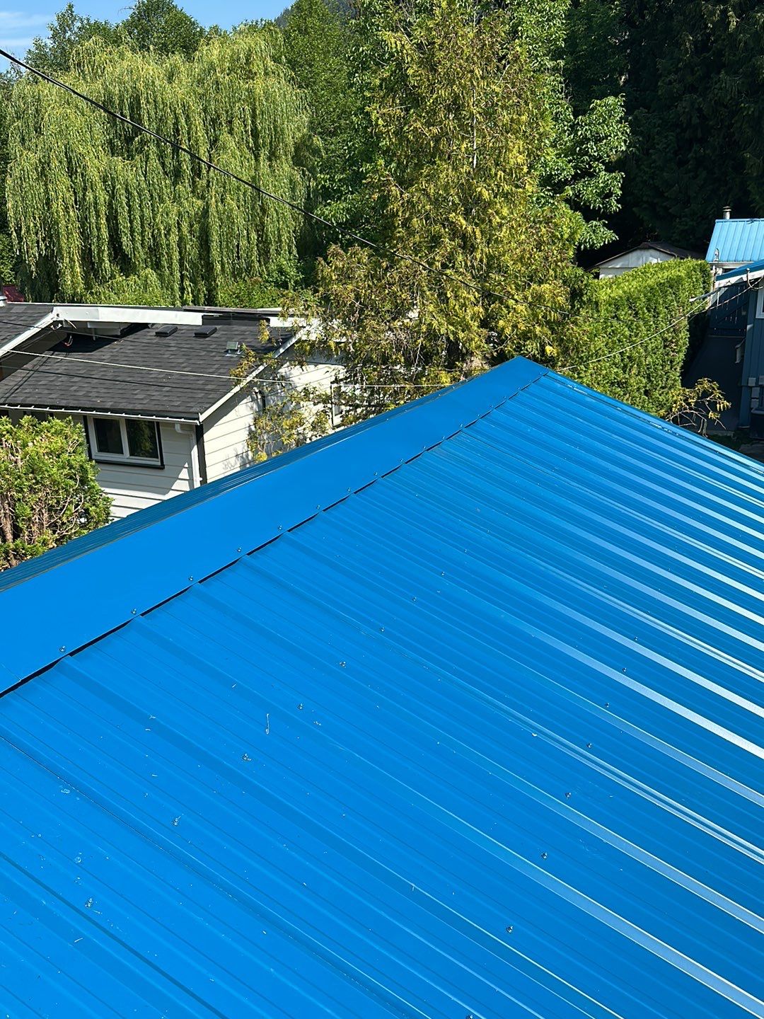 Residential ReRoofing Installation using Duraclad 26ga by Top Notch Roofing Inc