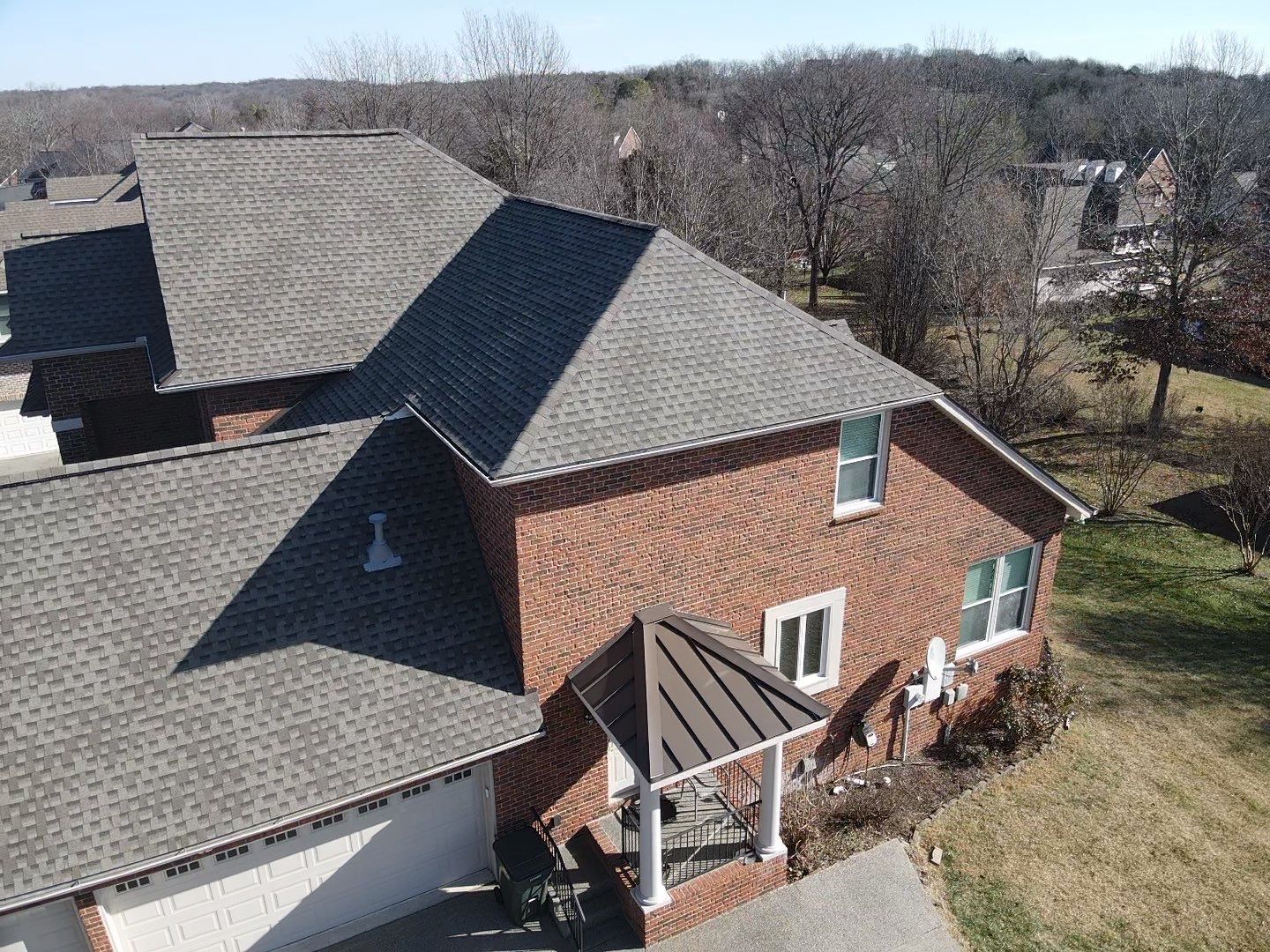 Residential Roofing Installation using GAF Timberline HDZ Weathered Wood Shingles by Undersun Roofing 