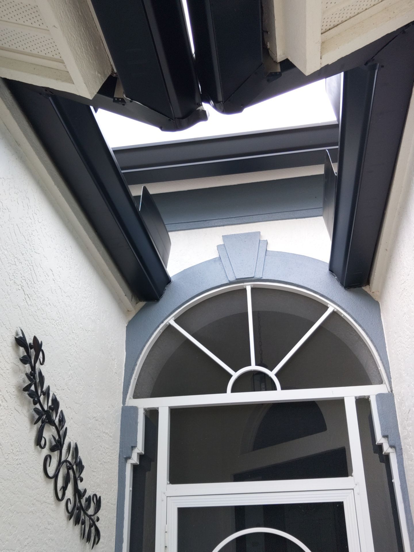 Black Seamless Gutters  by Gutter Professors