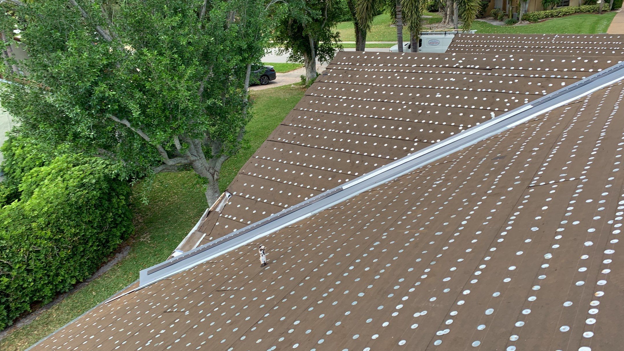 Residential Roofing Installation using 1" Nail strip metal roof by BLUES BROTHERS ROOFING