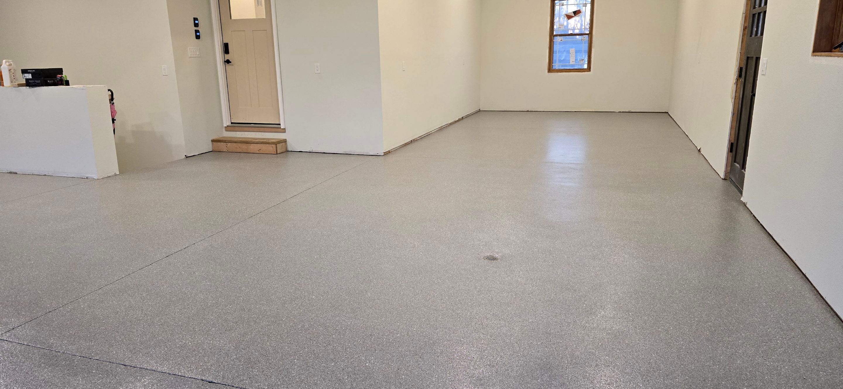 Garage using Travertine by Elite Floor Solutions