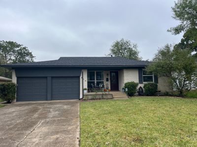 White brick/black accents with IKO Granite Black