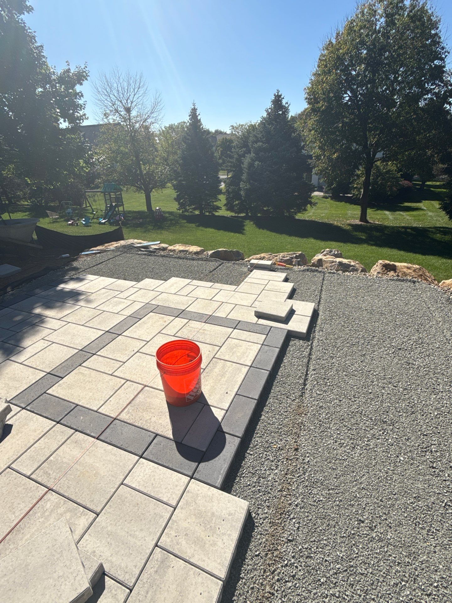 Backyard Retreat: Techo-Bloc Patio + Firepit Lounge by Saylor’s Lawn & Landscape