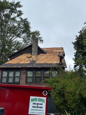 Roof Replacement with Skylight & Downspout Work in Belmont, MA