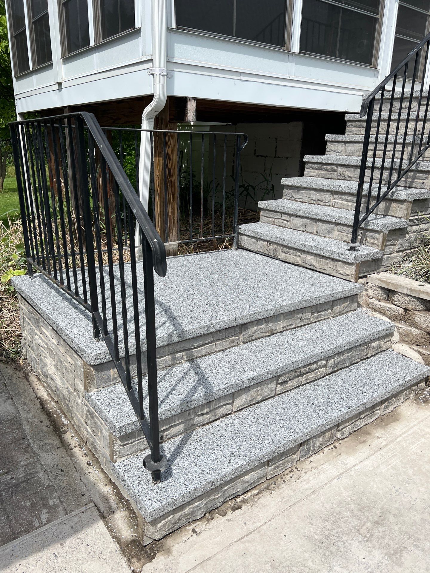 Silverado porch and steps coating by NG Masonry & Construction LLC
