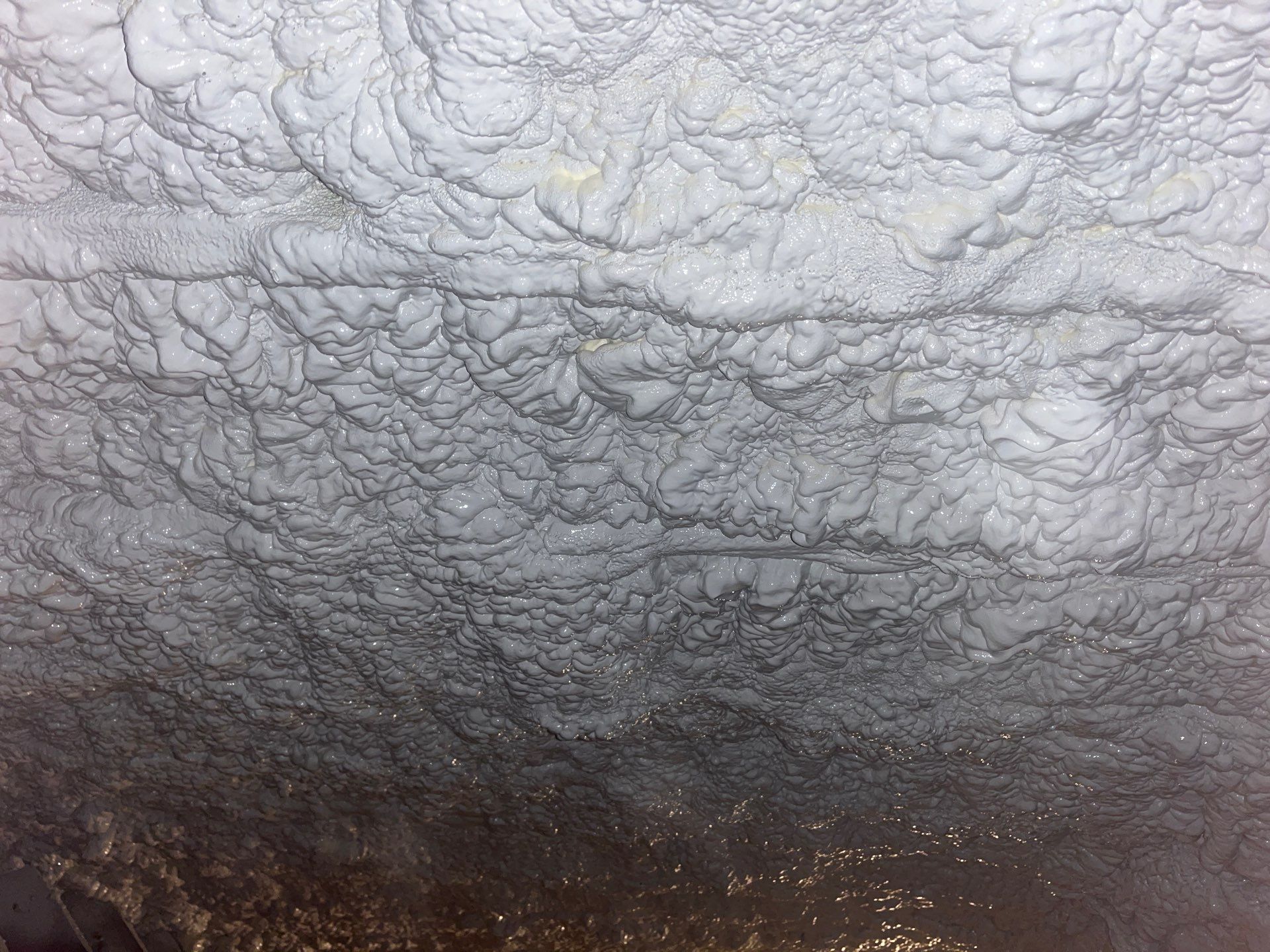 Attic Retrofit using open cell spray foam by NYS Foam & Energy