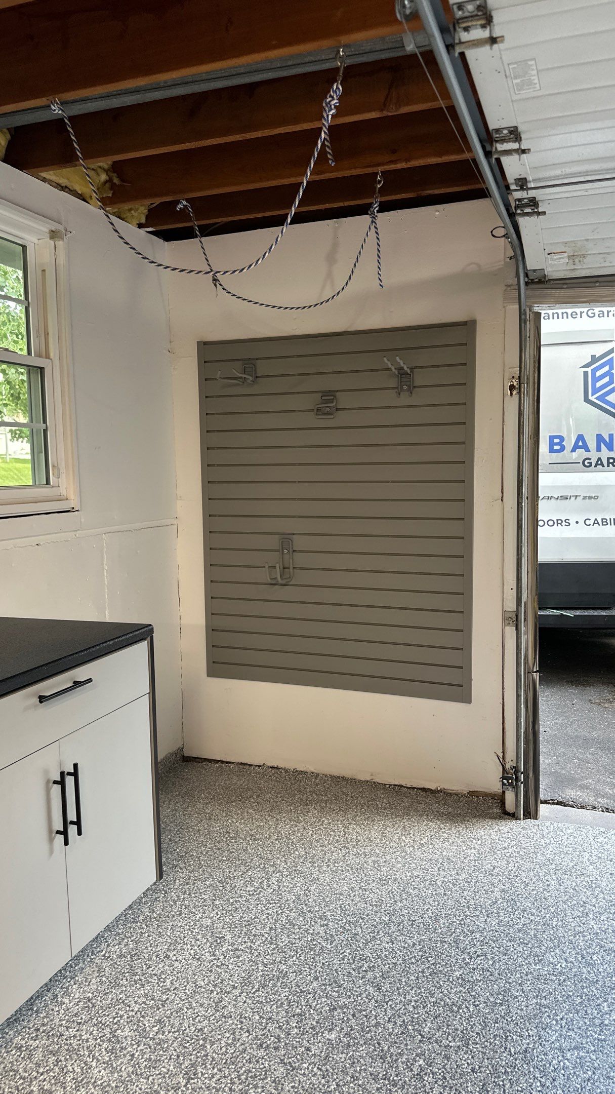 Vernon T. new garage floor and storage looks great!! by Banner Garage