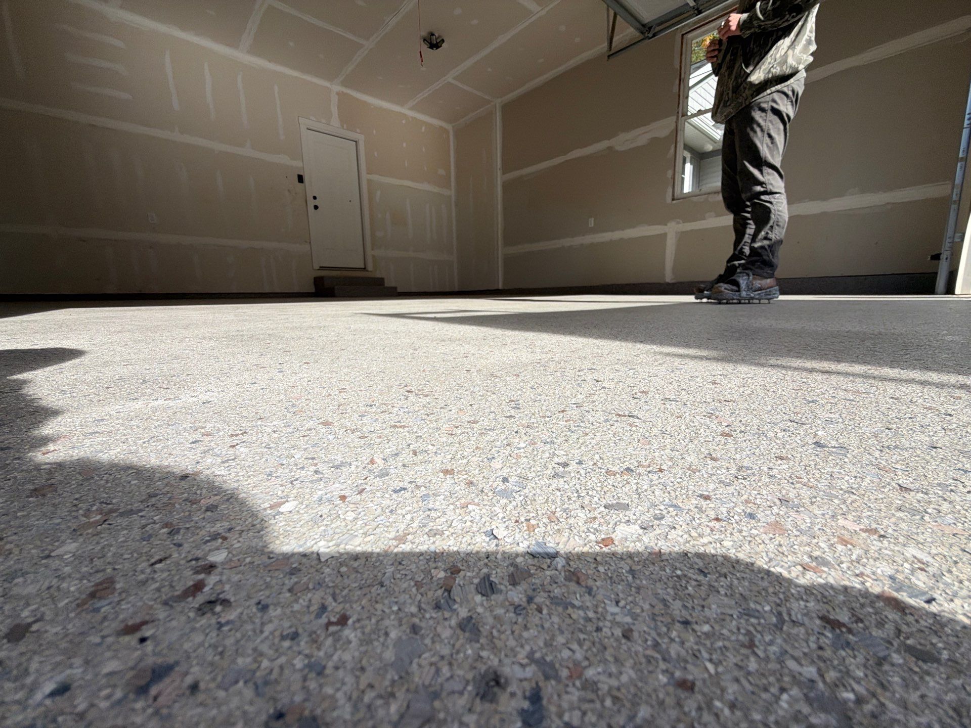 Hudsonville Garage Renovation Featuring Finished Drywall and Flake Epoxy Floors by Gordon Painting