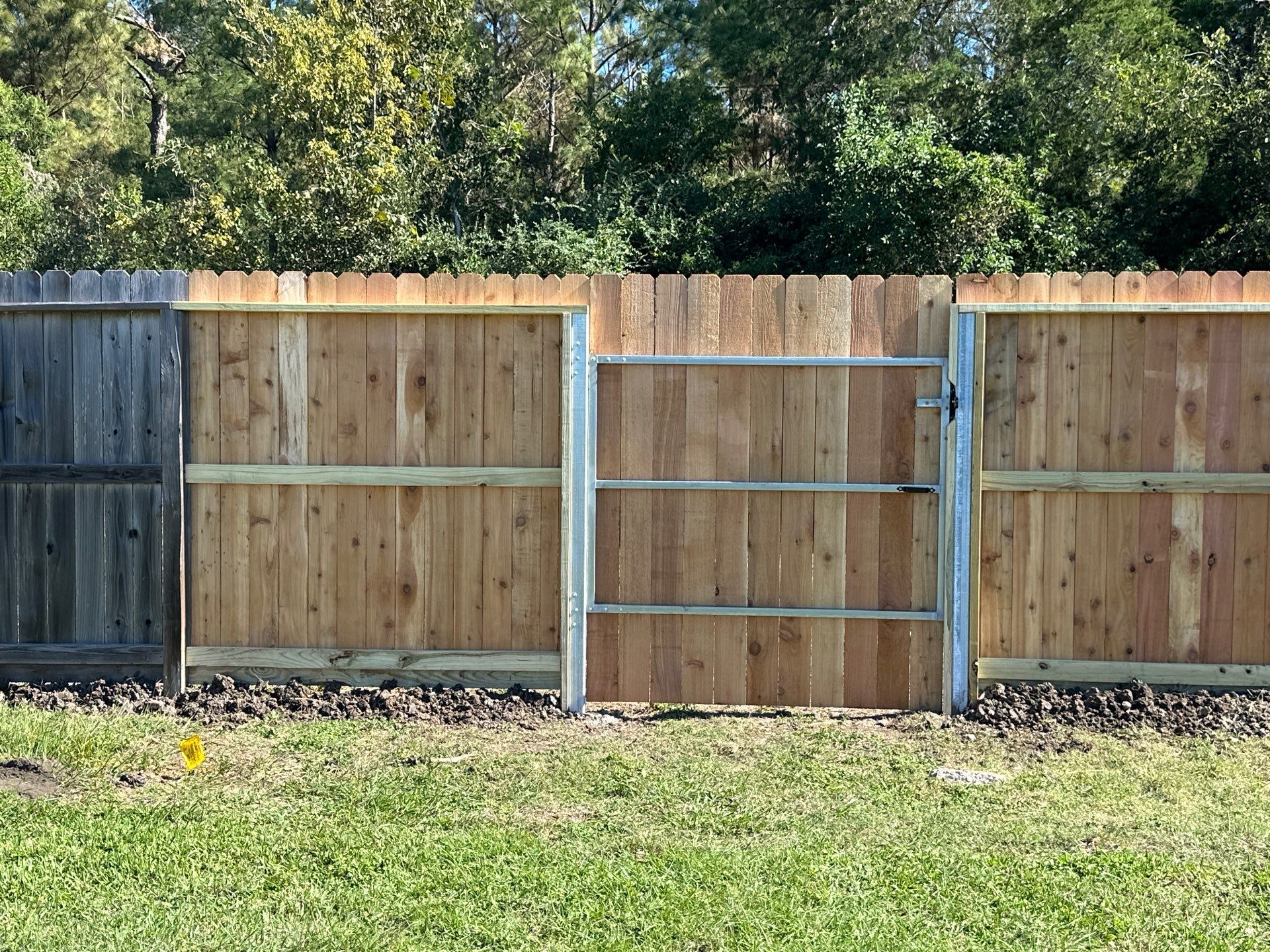 Premium Commercial Fence Installation with Western Red Cedar Pickets, 3 Rails, and Deluxe Wood Gates" by Tim's Fences