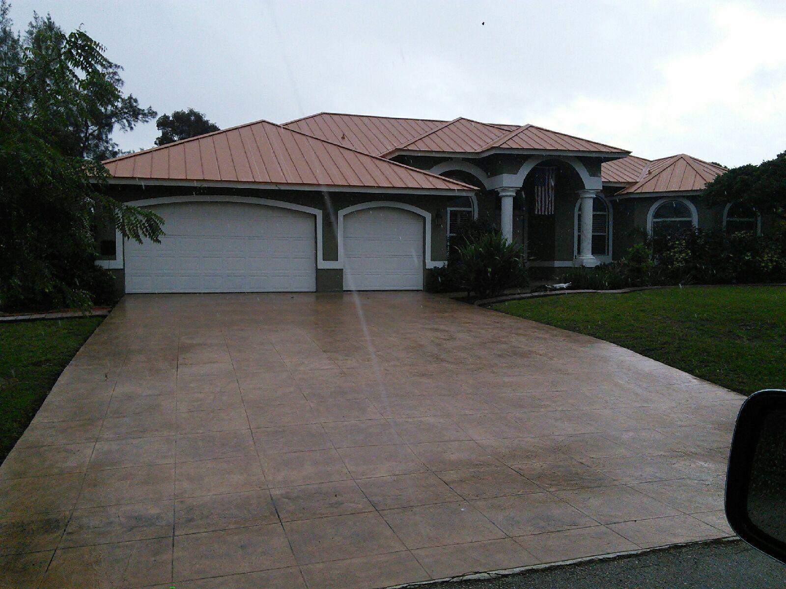 Residential Roofing Installation using 1" Nail strip metal roof by BLUES BROTHERS CONSTRUCTION CORP