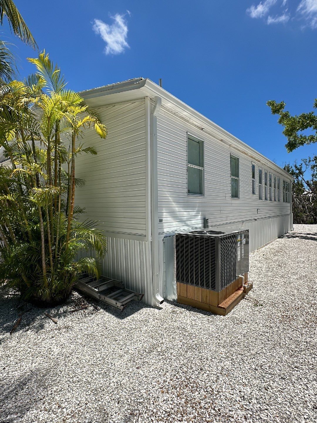 Downspout Installation using Charcoal Grey in Sanibel FL by Gutter Professors