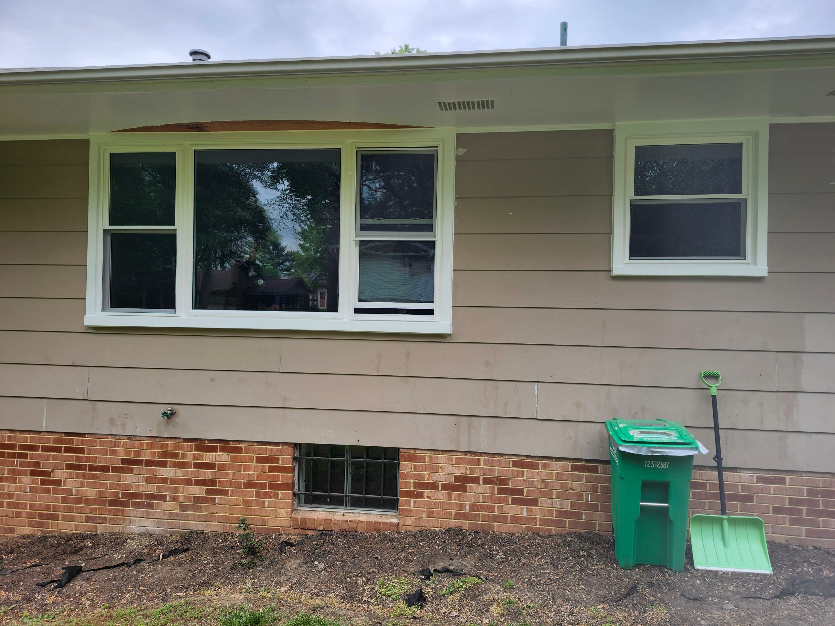 Bow window replacement with flat window by Window Depot of Annapolis