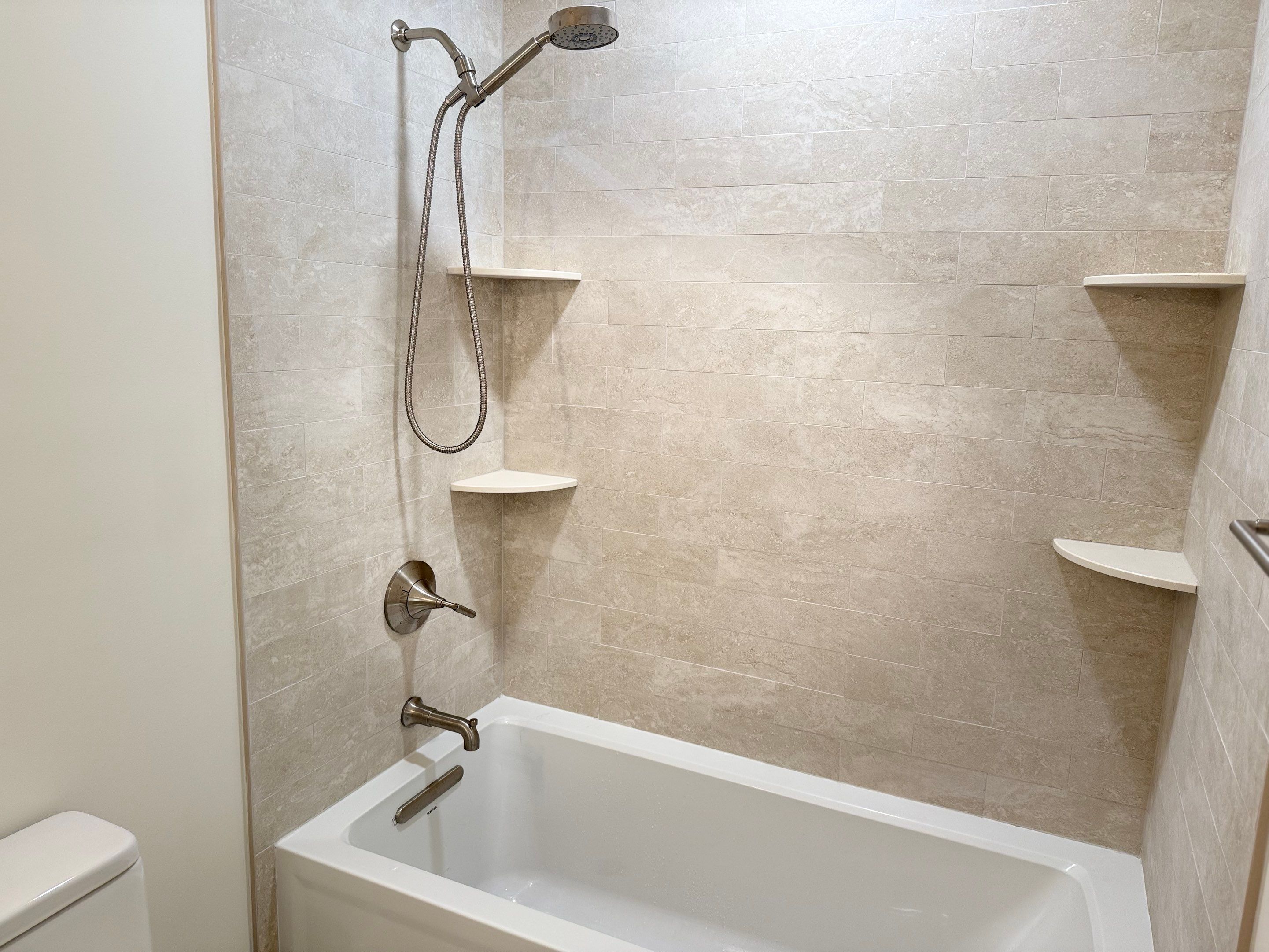 Bathroom Remodel using Tile by Home Concepts Construction