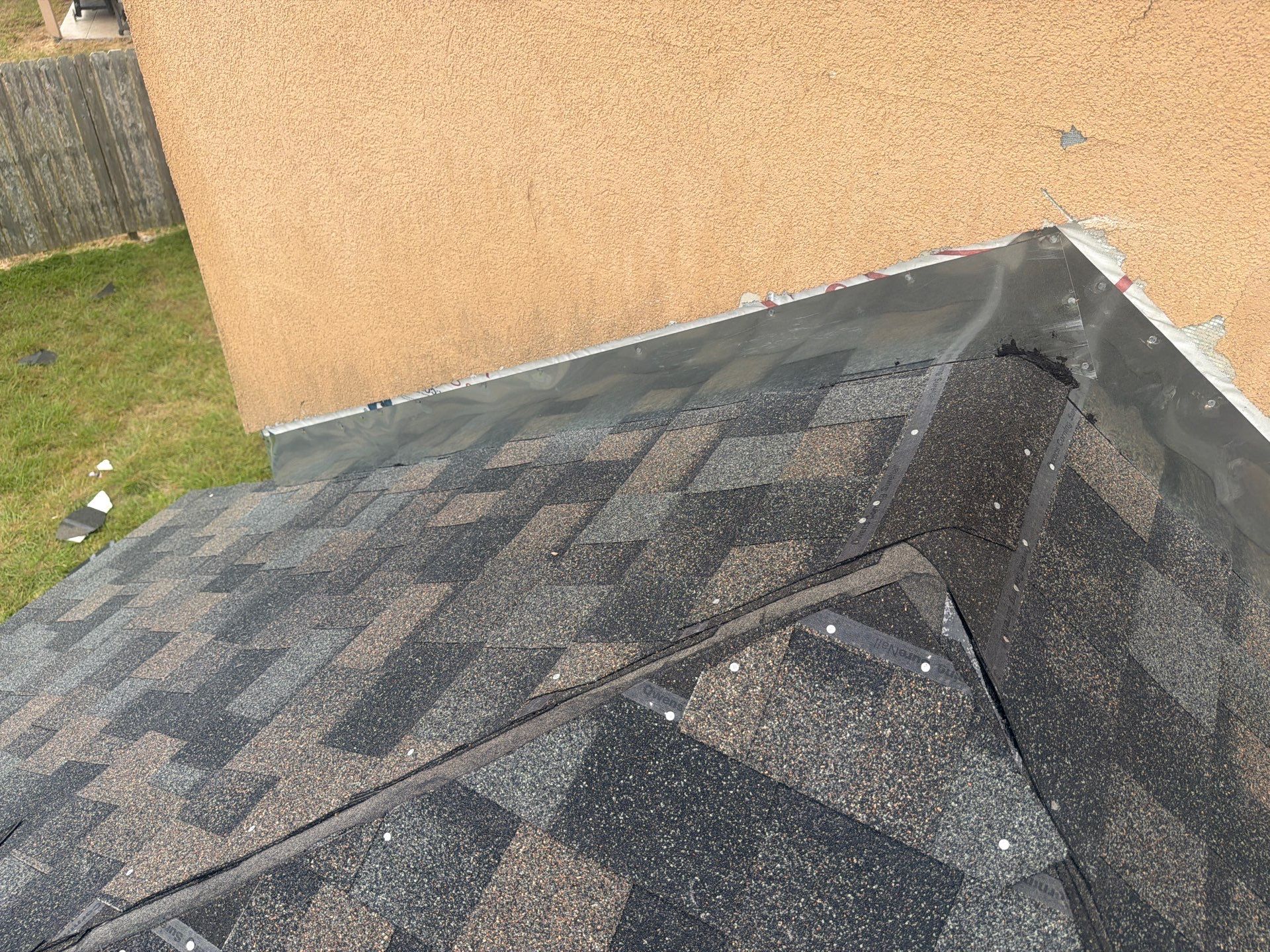 Flashing Stucco above the Roof by Bayfront Roofing and Construction