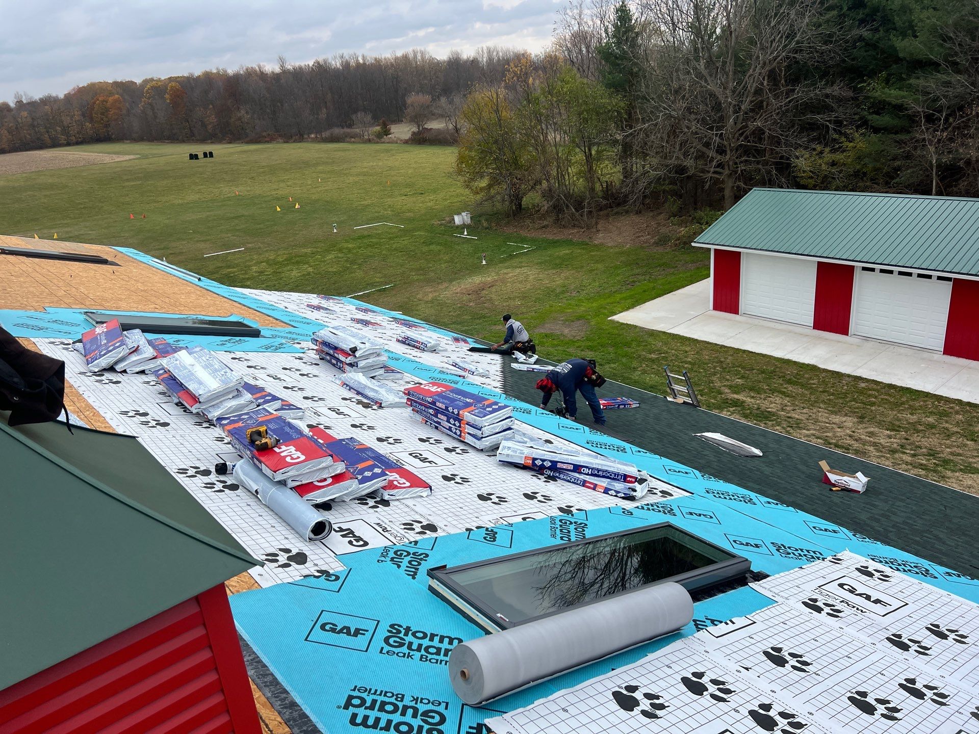 Residential Roofing Replacement with Multiple Skylights in Mason, Michigan by Acme Exteriors